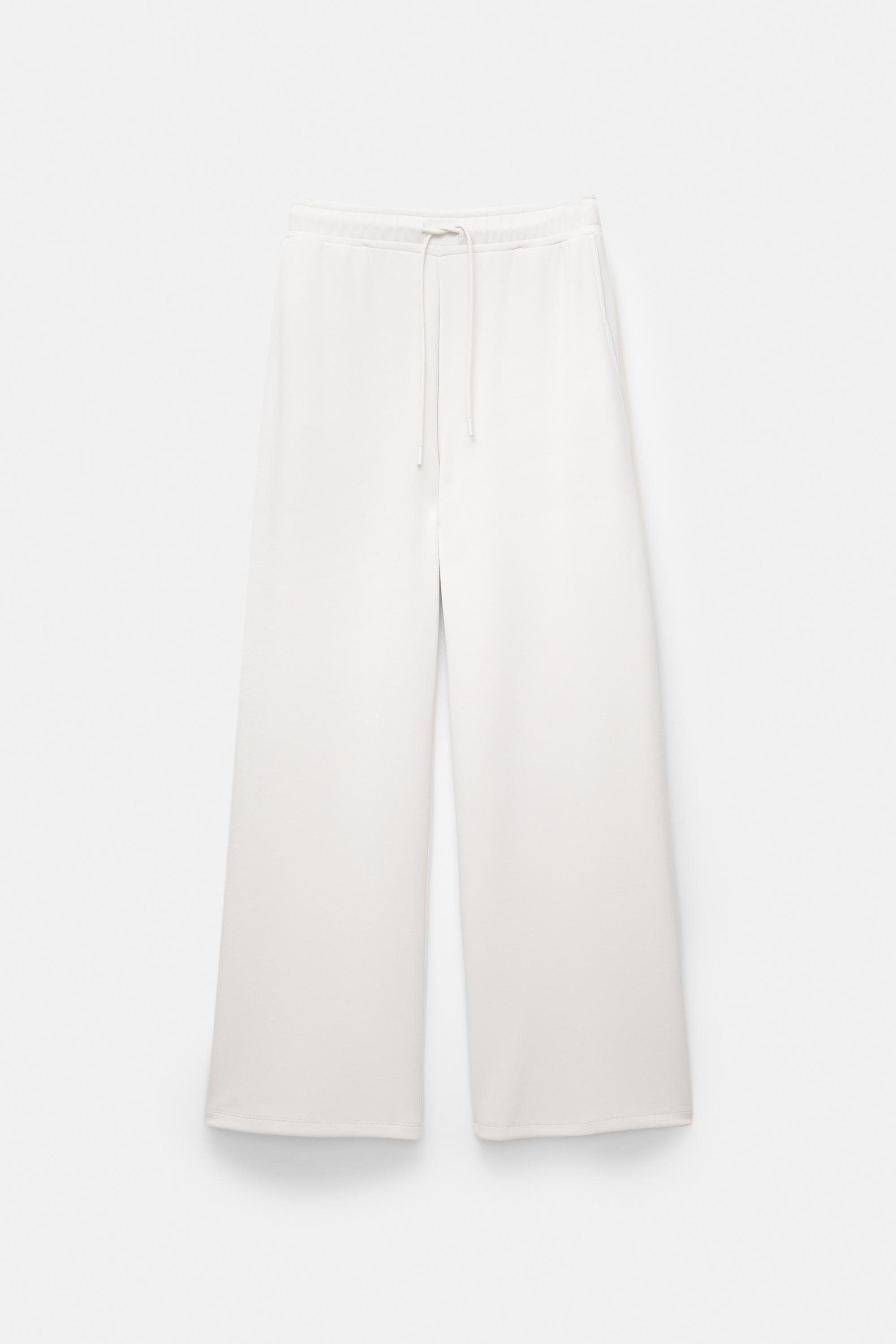 Soft-touch wide-leg trousers — Ecru