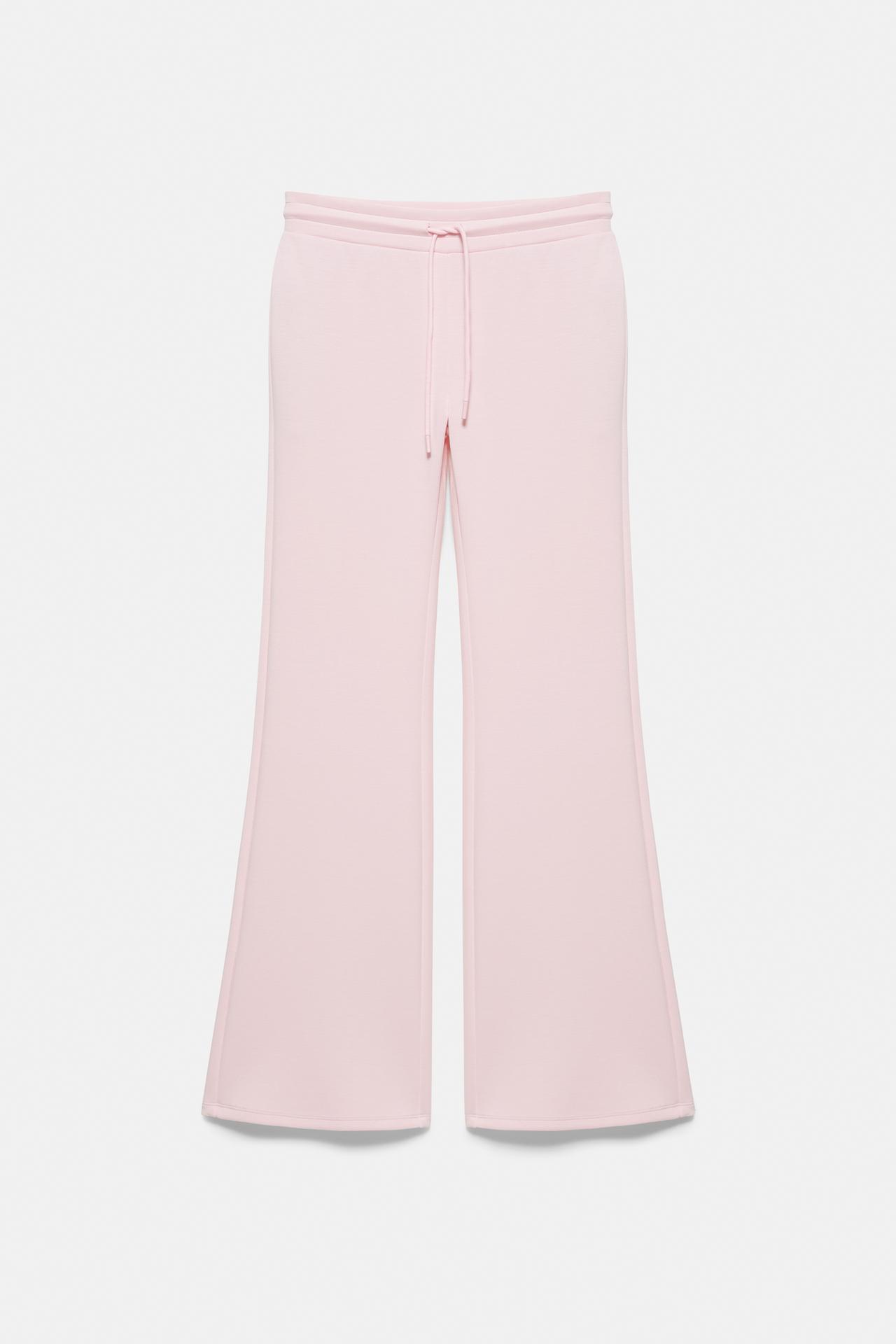 Soft-touch flared trousers — Pastel pink
