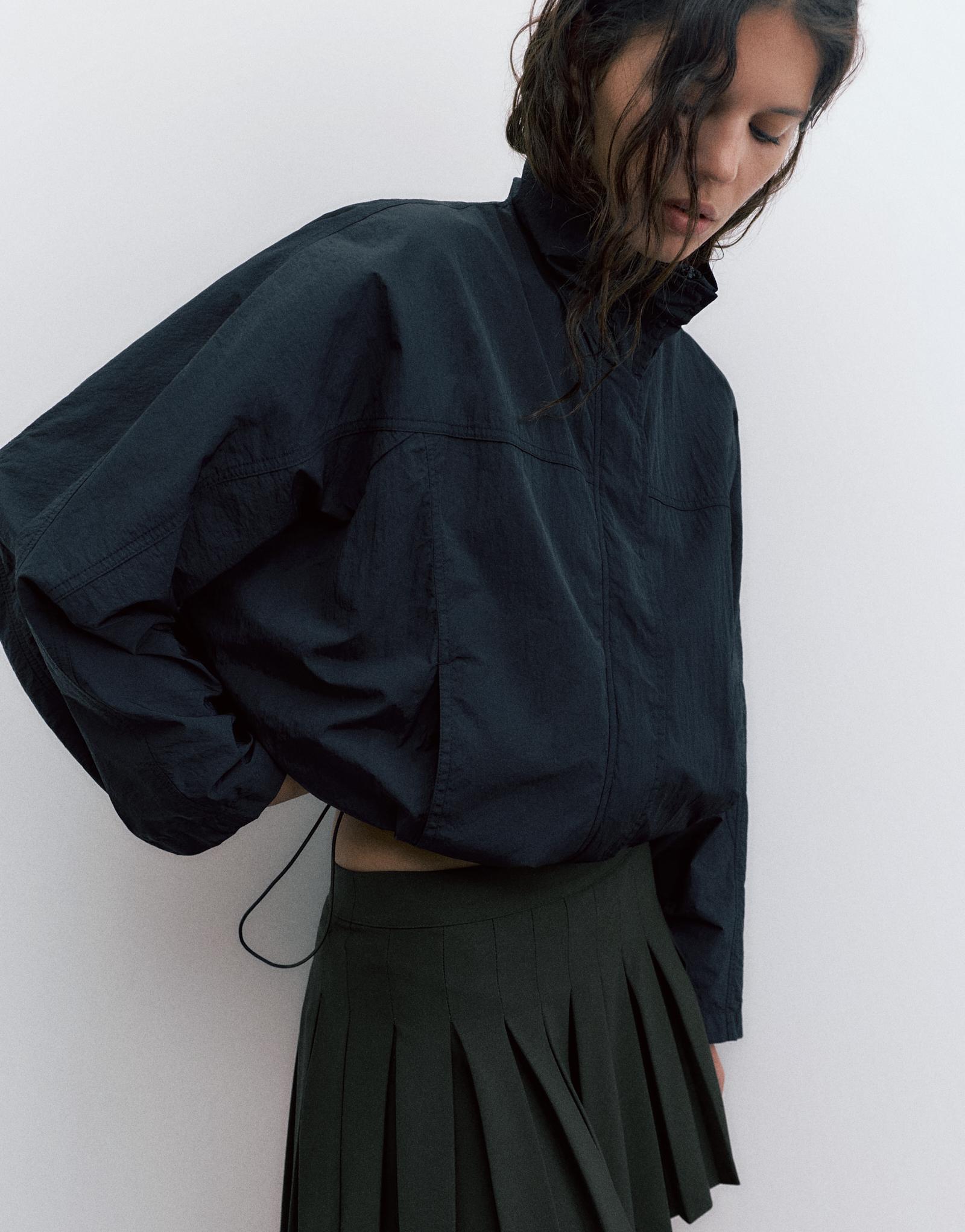Pleated mini skirt — Black