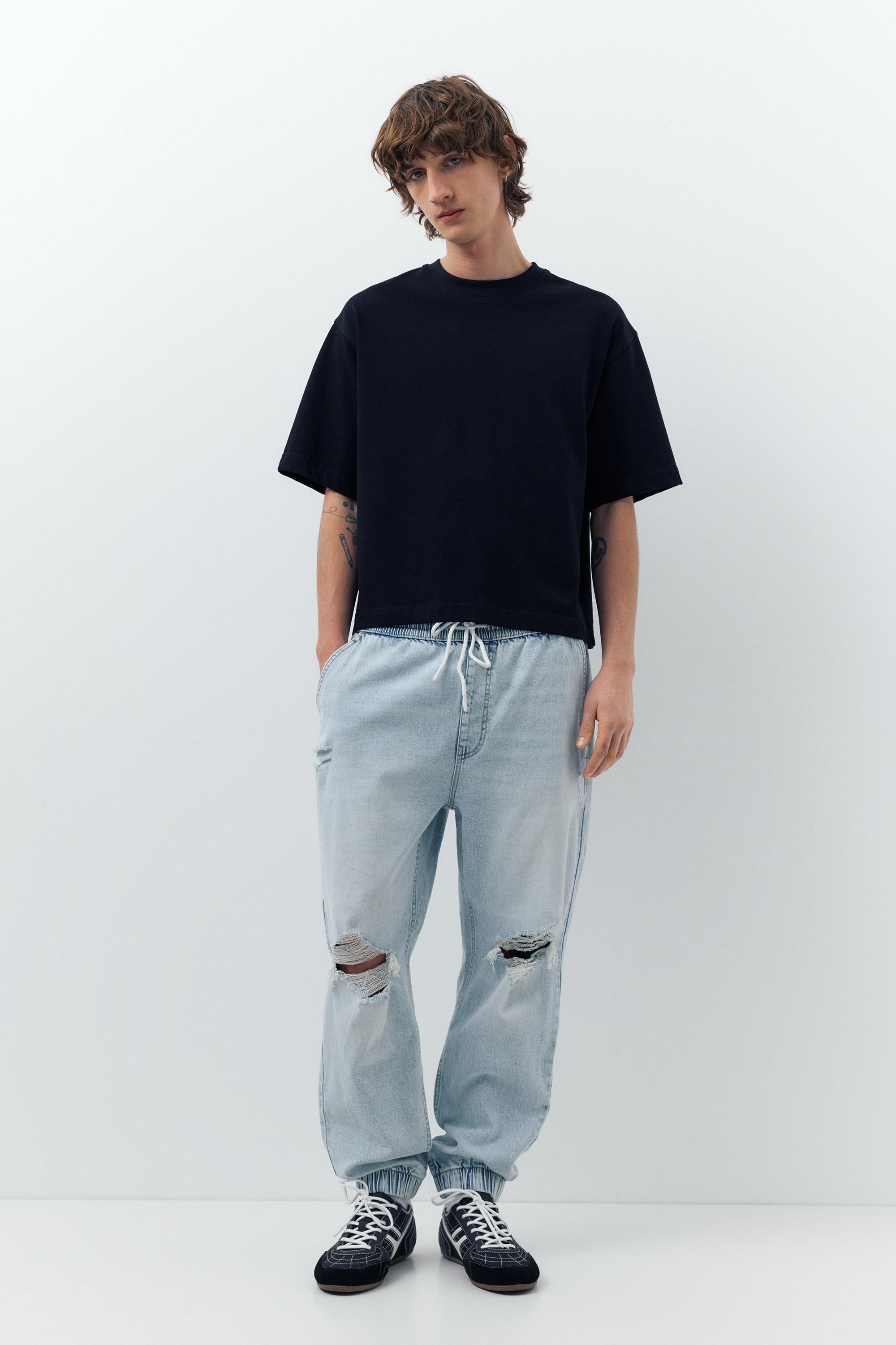 Pantaloni Jogger In Denim Strappati