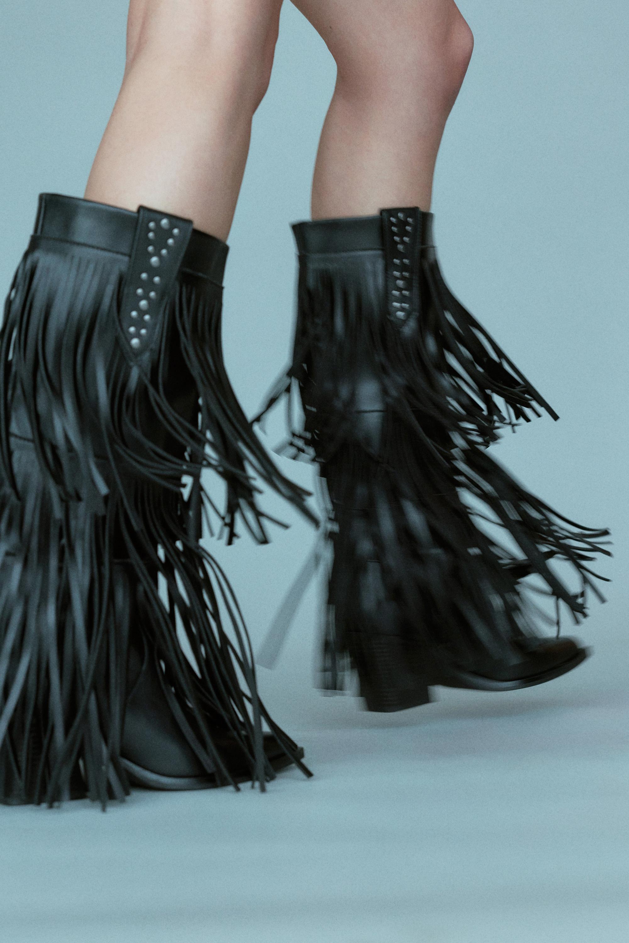 Fringed cowboy boots — Black