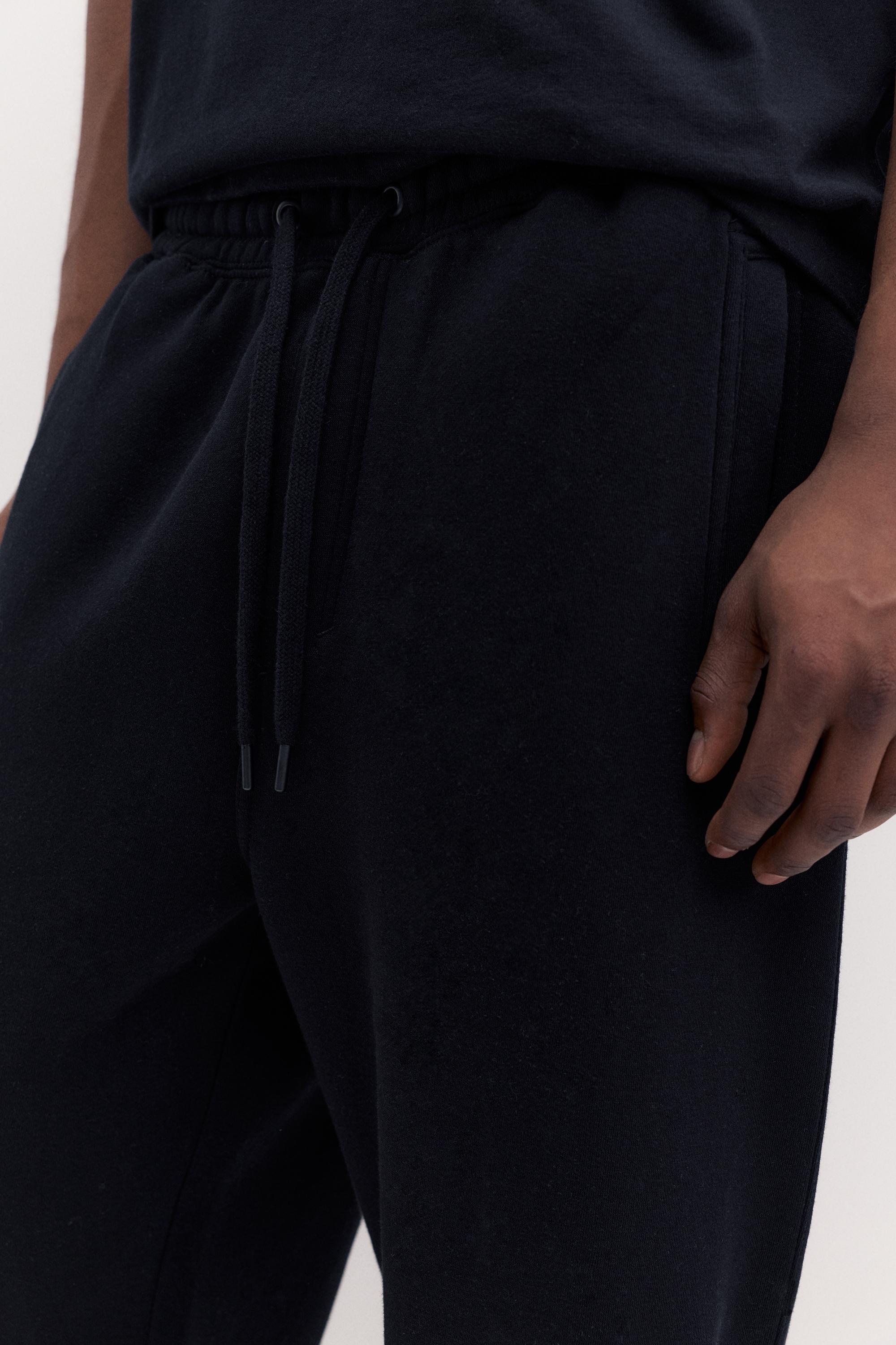 Basic baggy tracksuit bottoms — Black