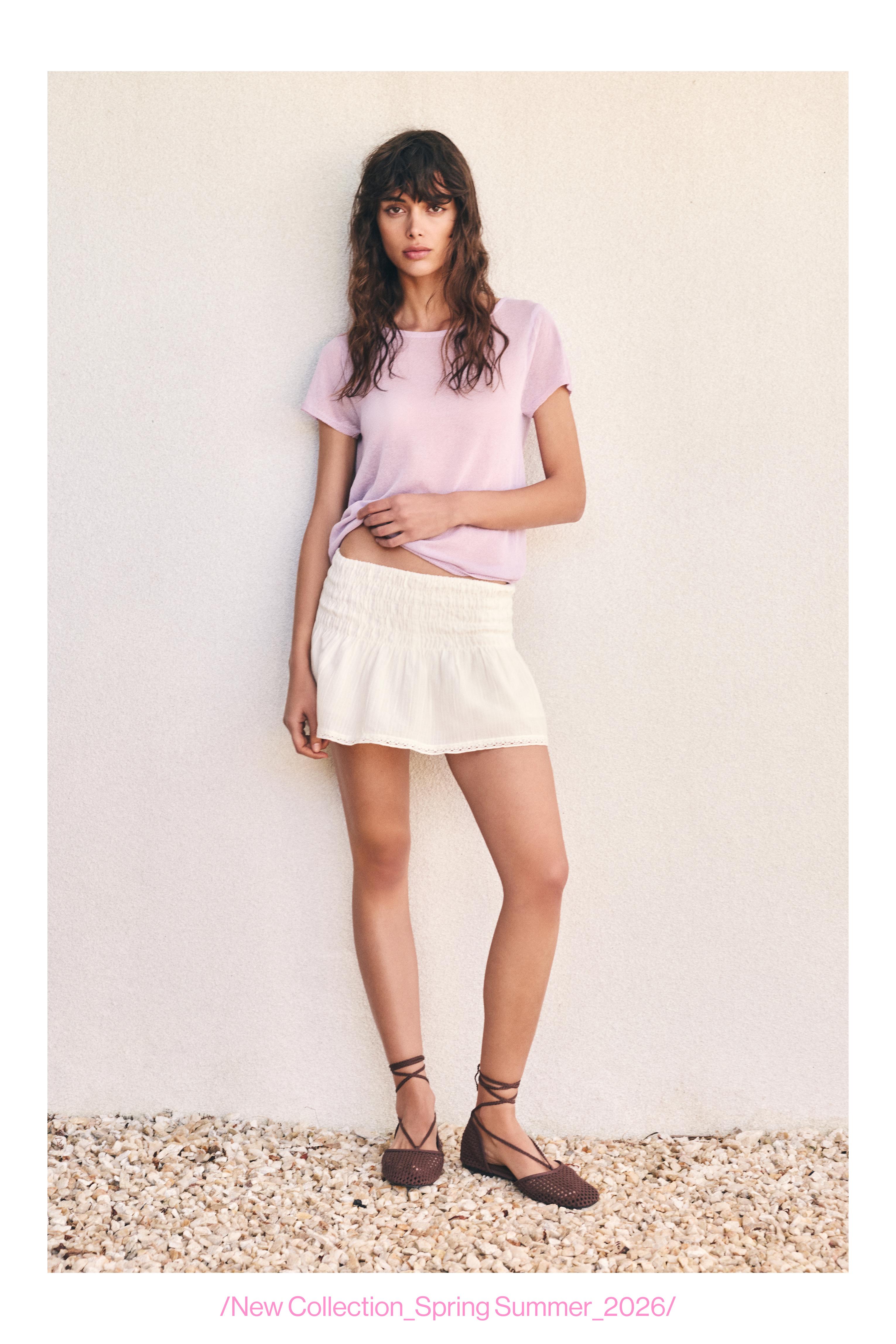 Short sleeve open-back knit top — Lilac