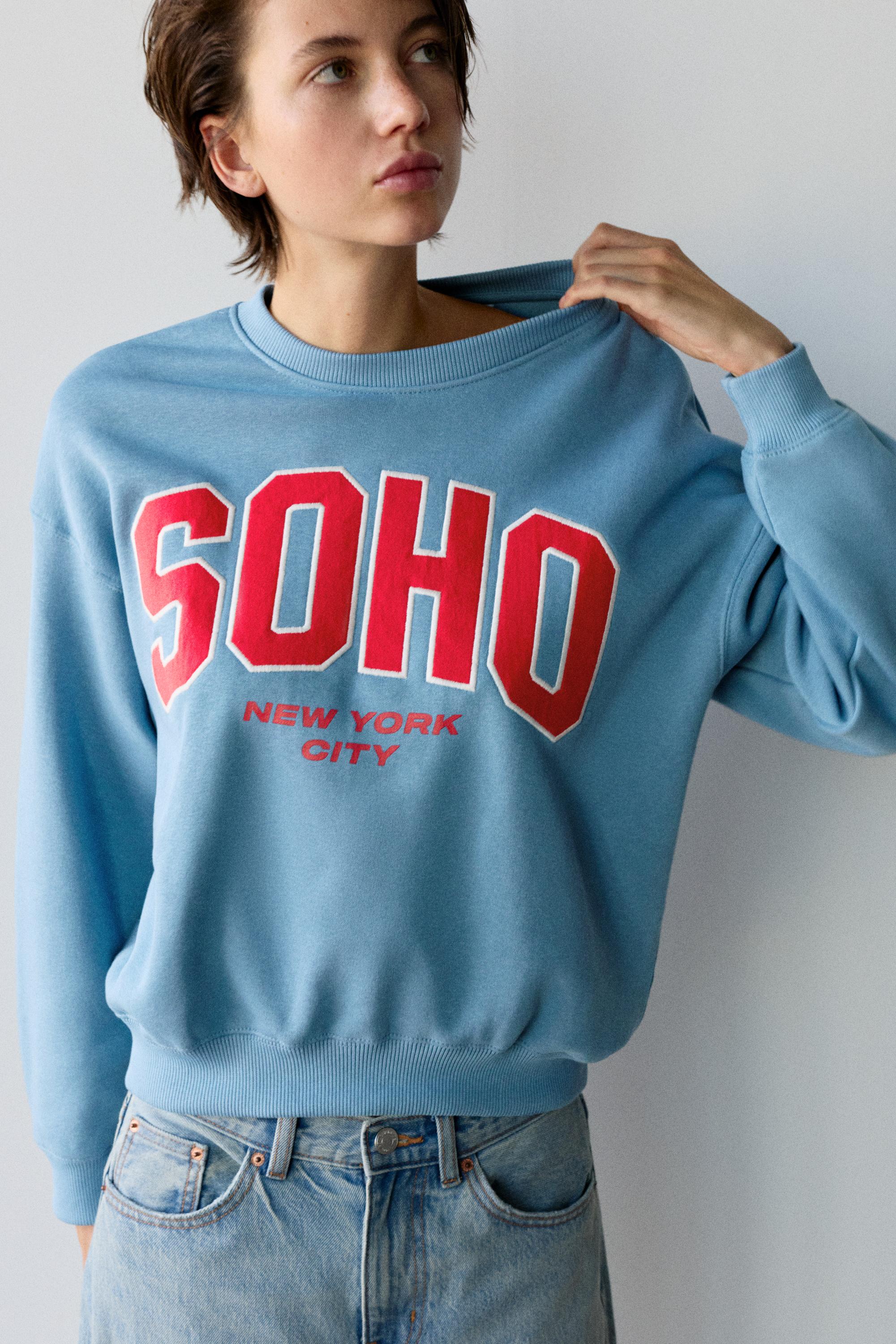 Sudadera cuello redondo gráfico