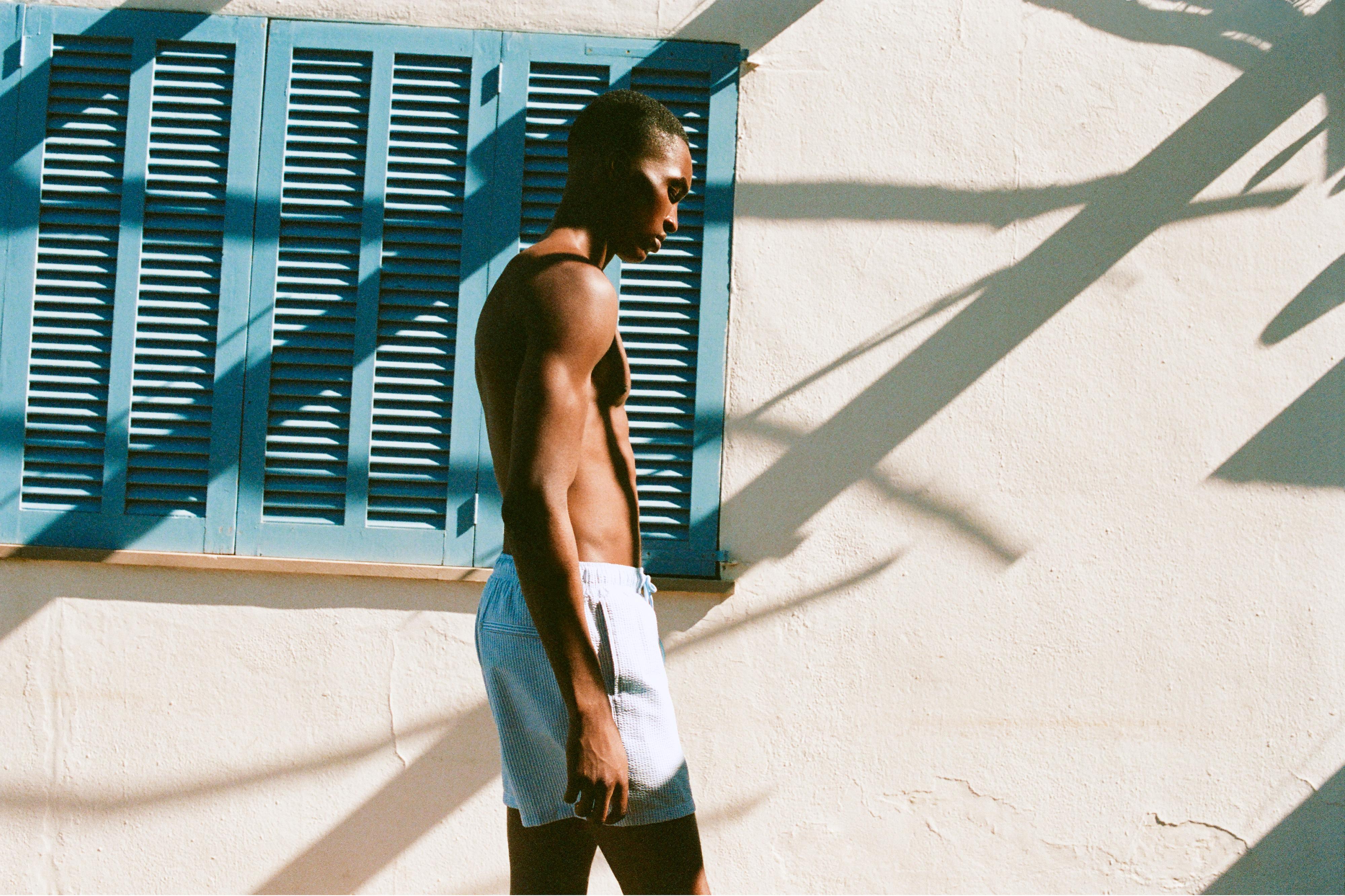 Striped seersucker swimming trunks — Blue