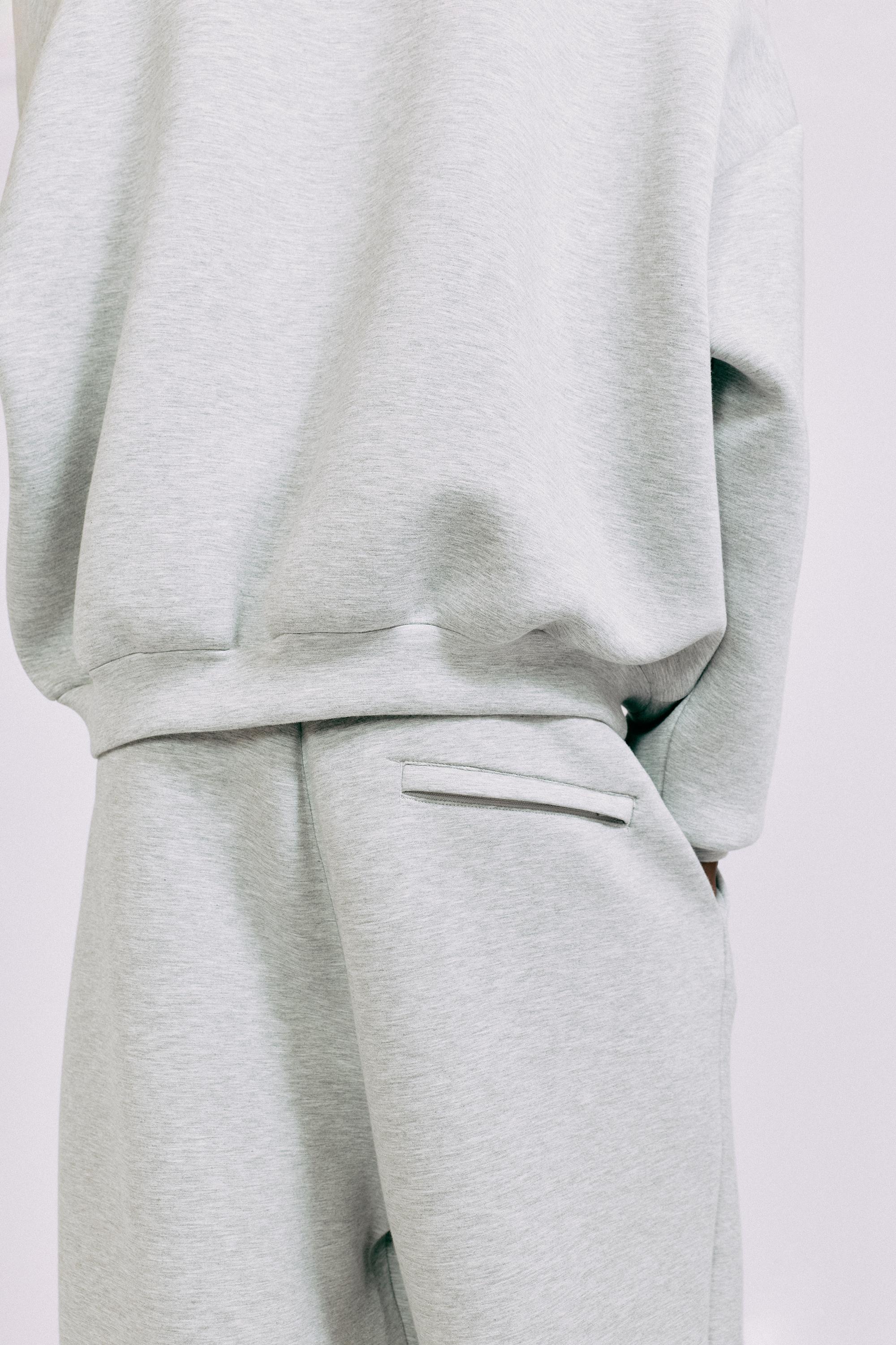 Interlock jogging pants — Grey marl