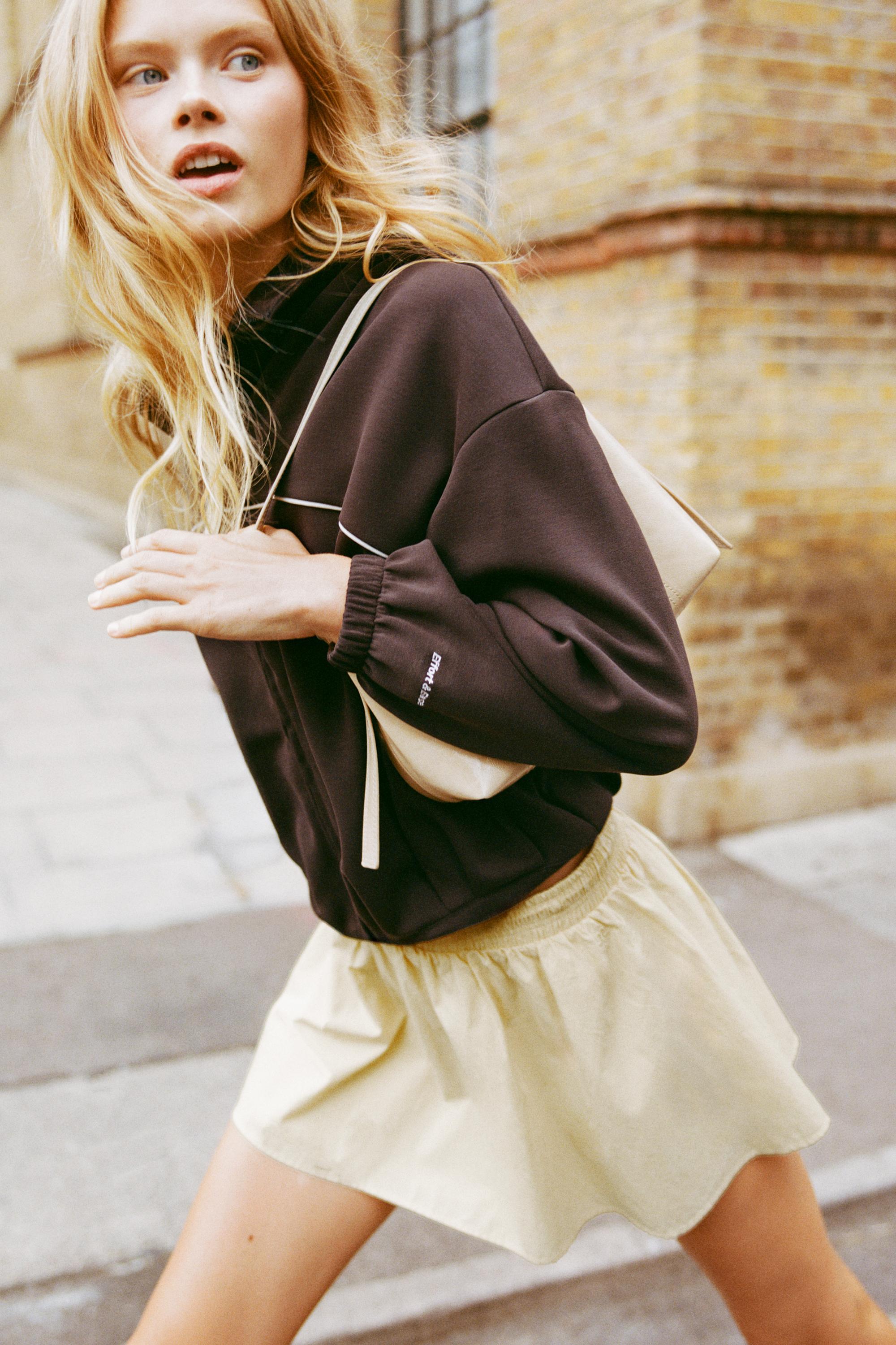 Technical mini skirt with stopper — Vanilla