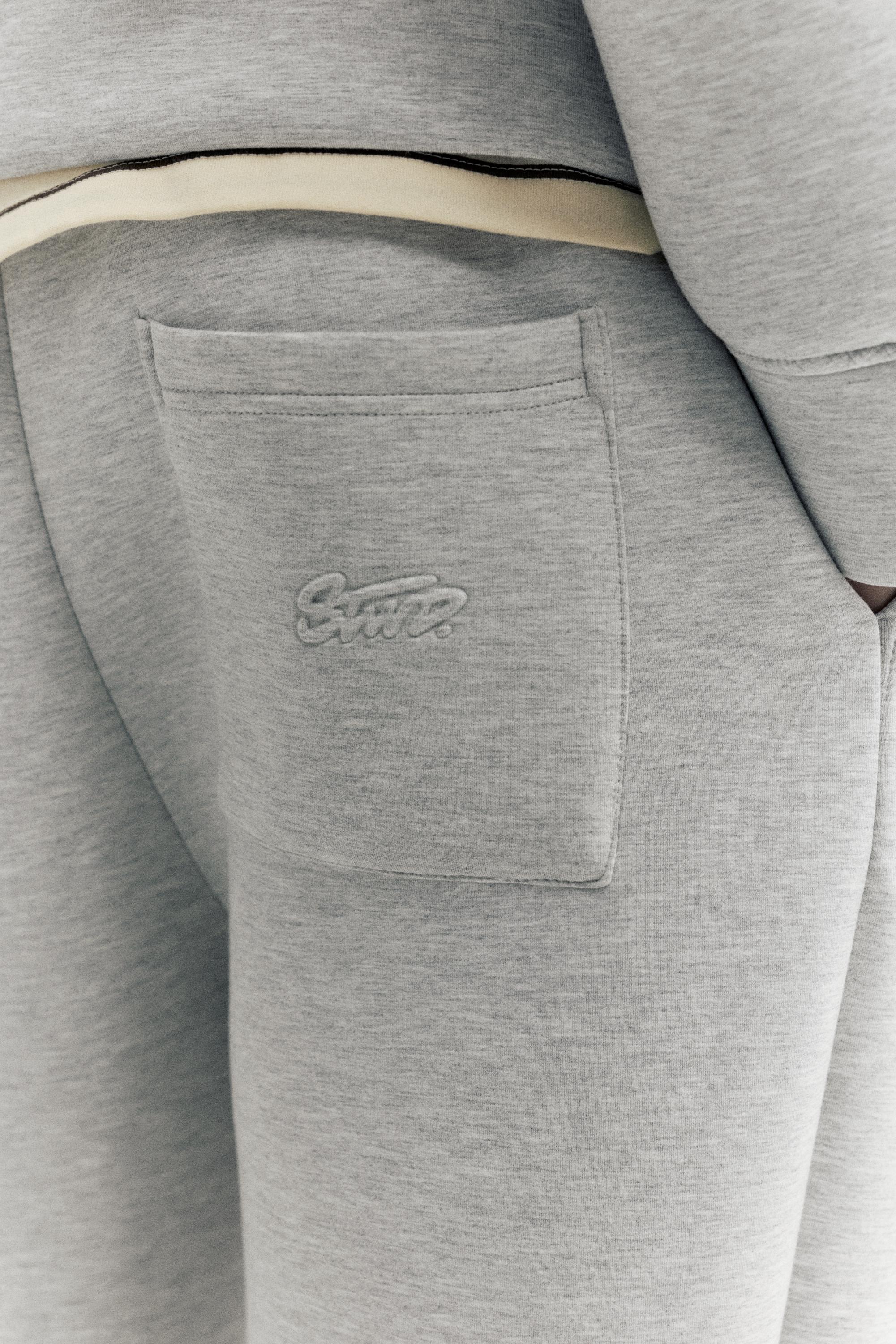 Neoprene-effect baggy trousers — Grey marl