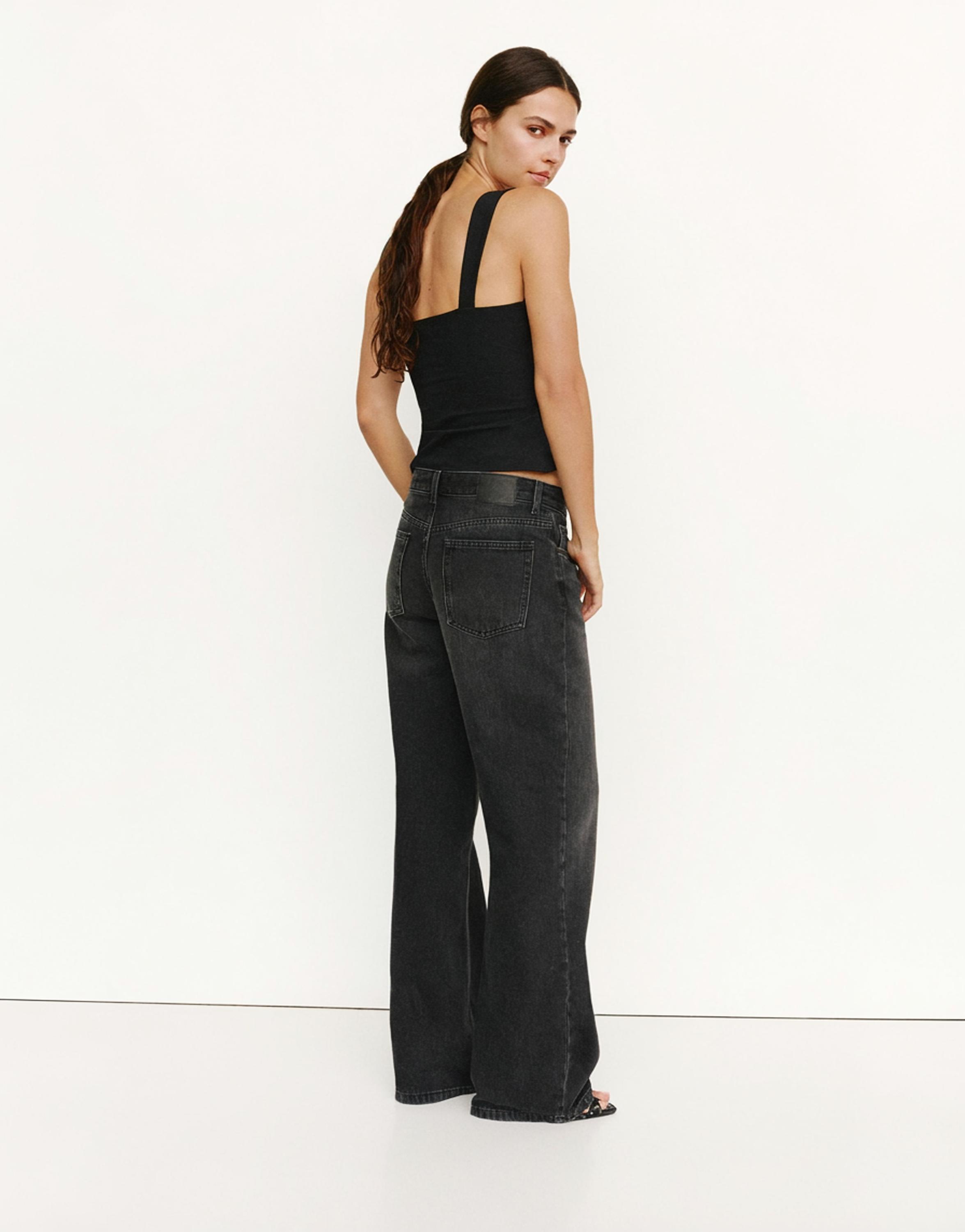 Strappy corsetry-inspired top — Black