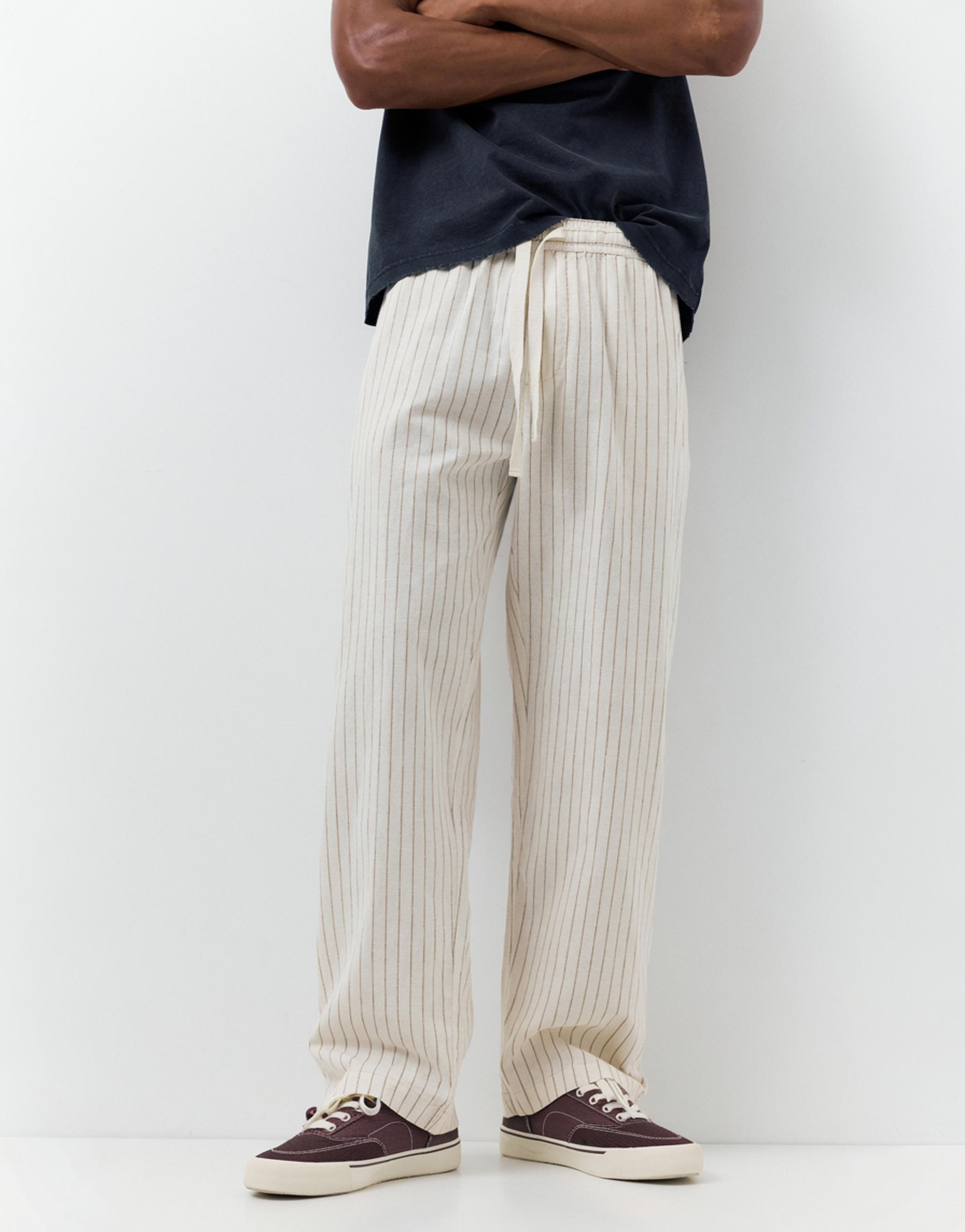 Linen blend jogger trousers — Striped