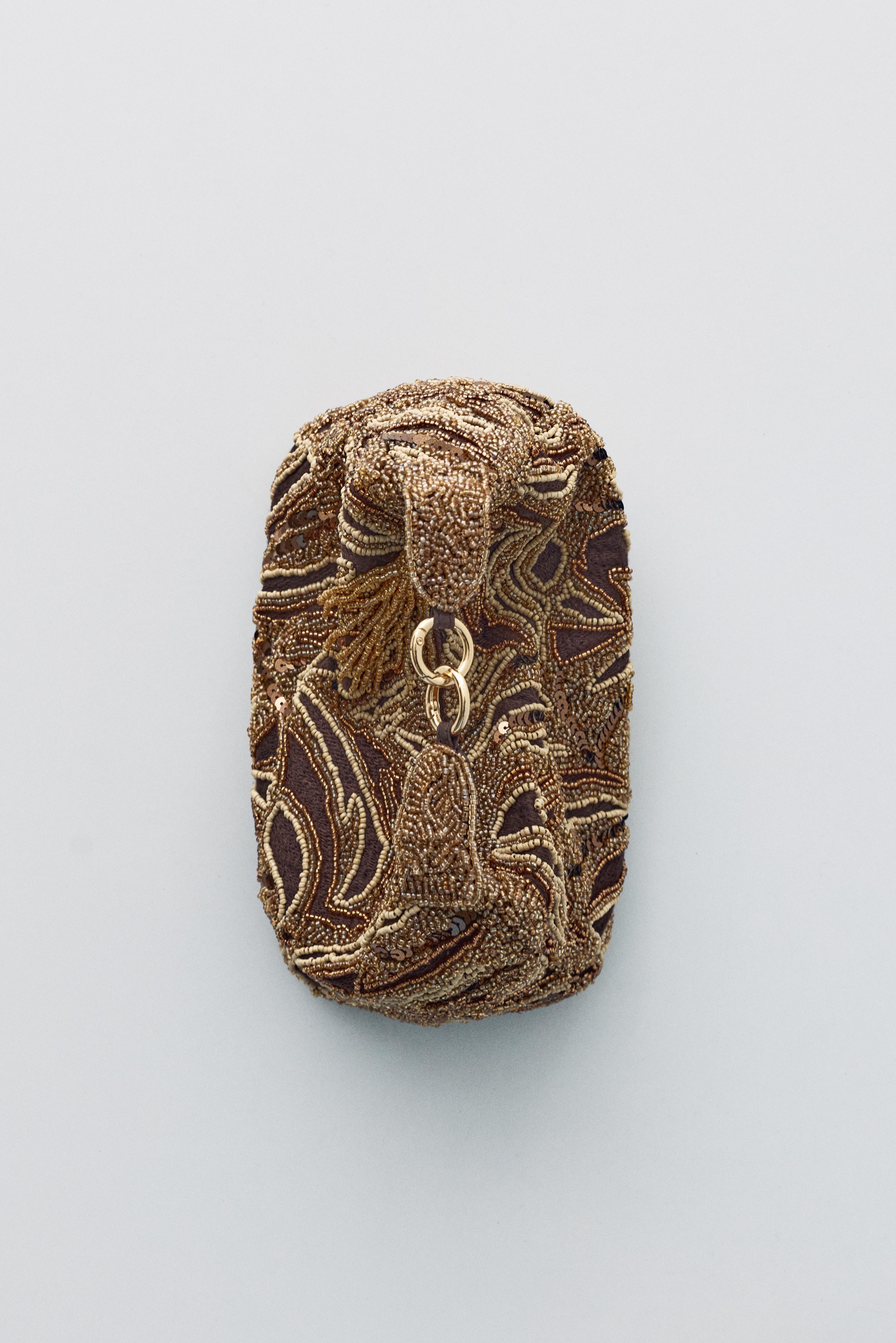 Beaded bag — Brown