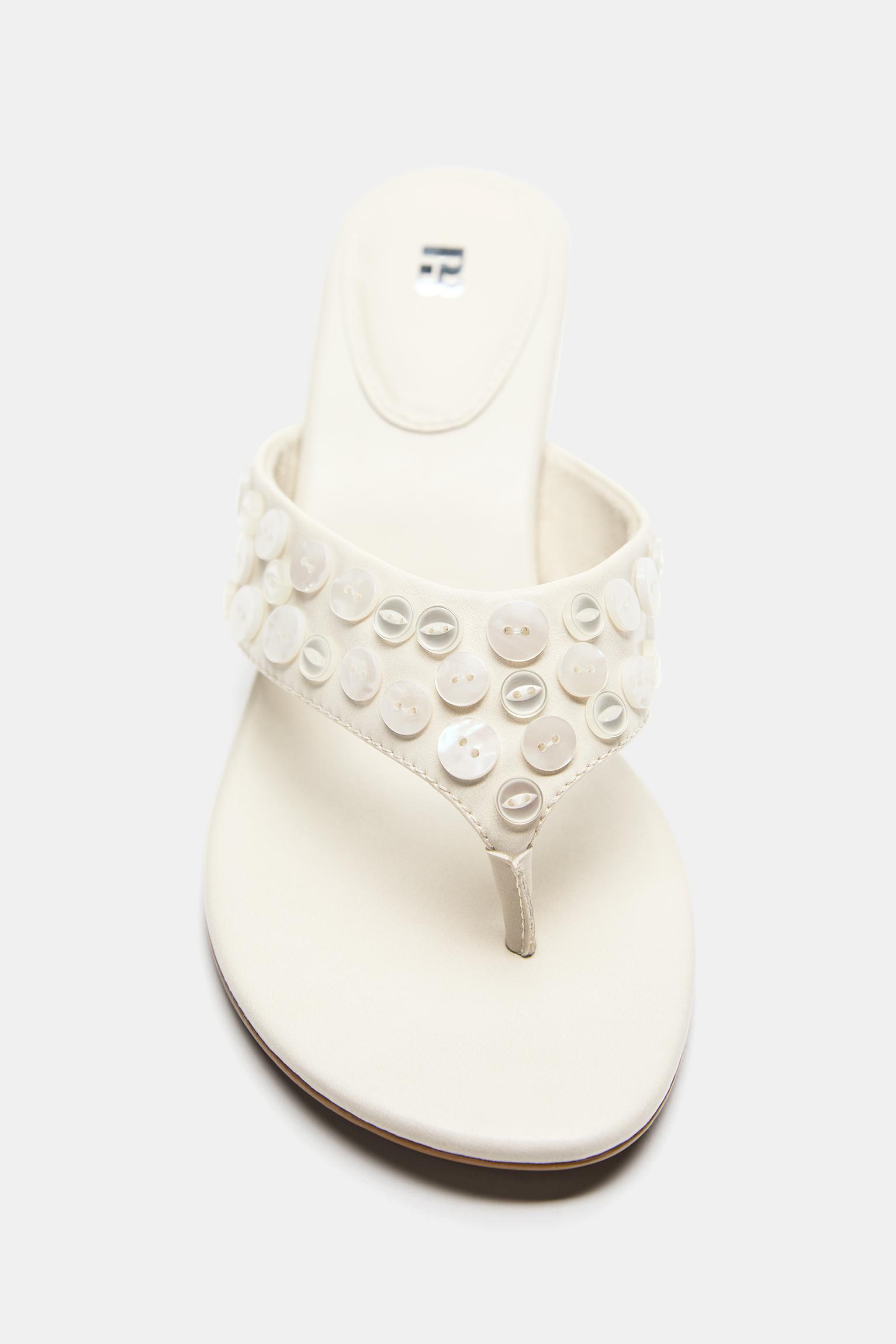Heeled sandals with button detail — Ecru