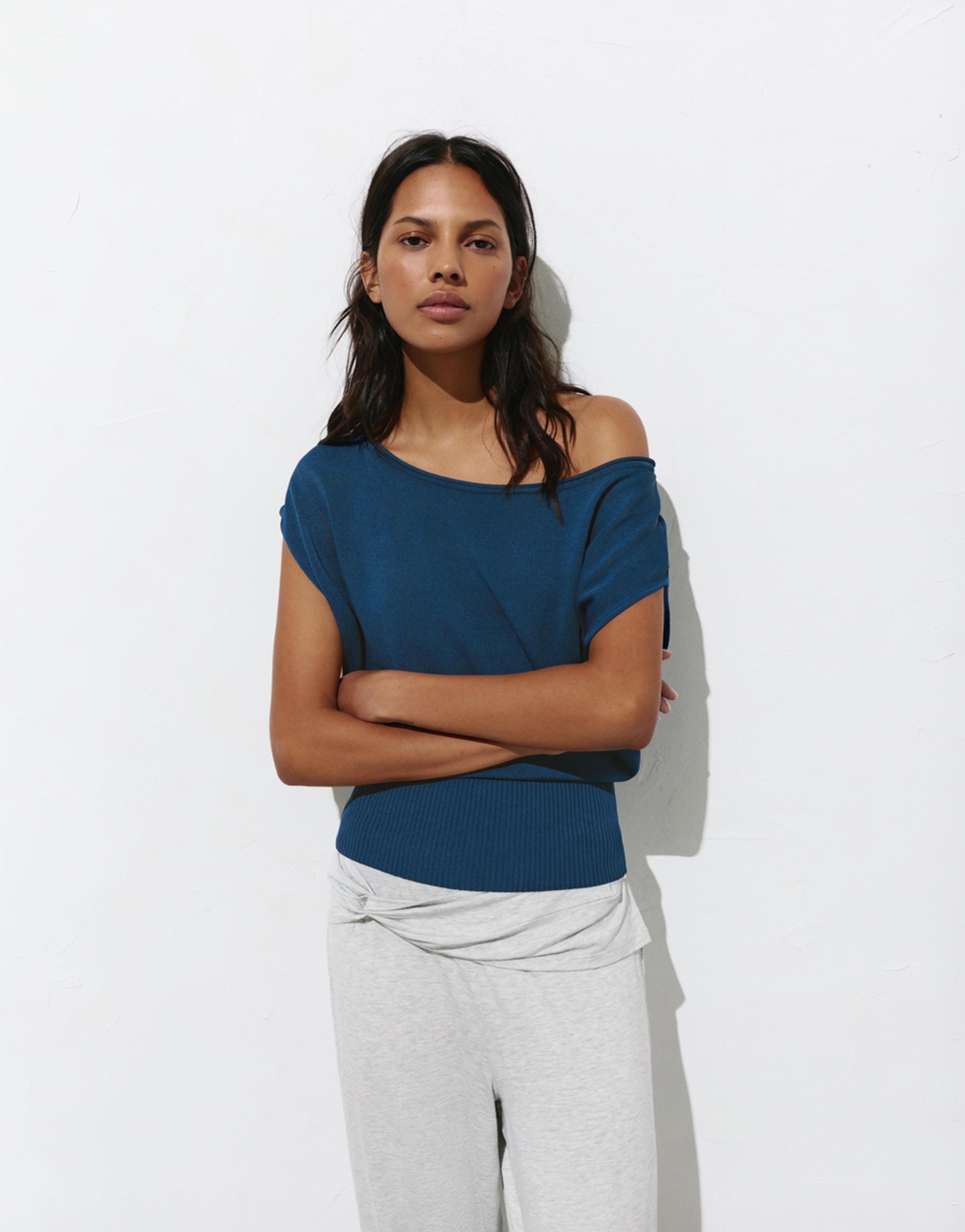Short sleeve asymmetric knit top — Indigo