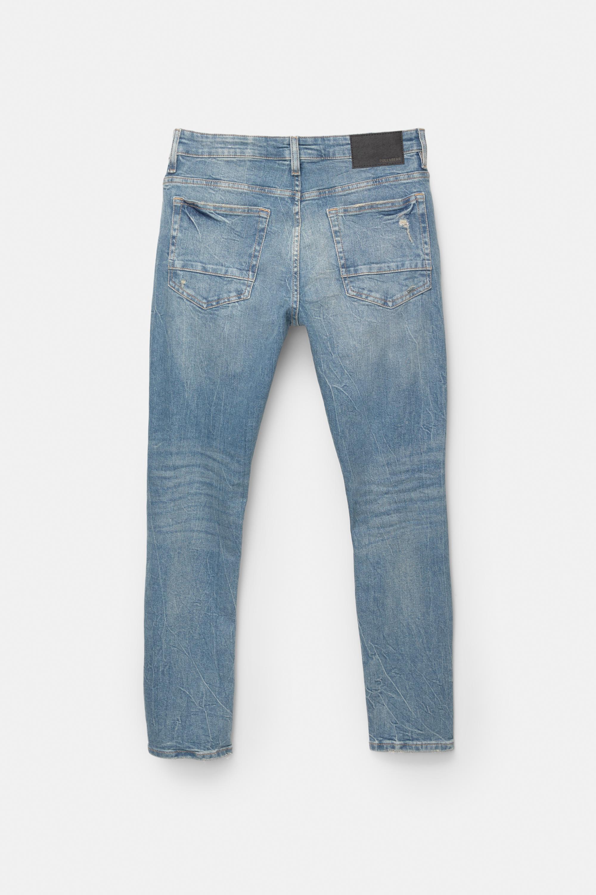 Ripped skinny jeans — Medium blue