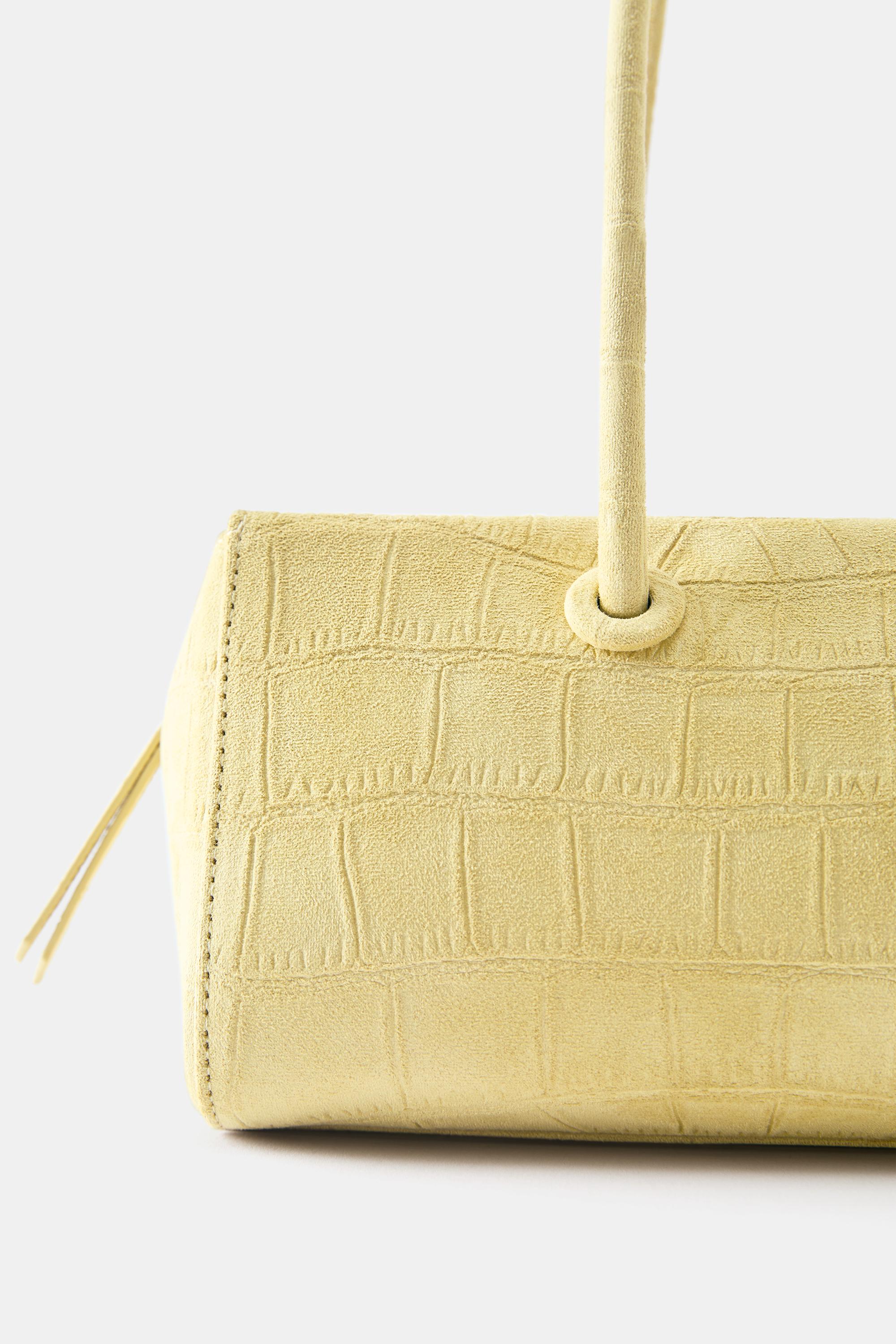Textured shoulder bag — Yellow