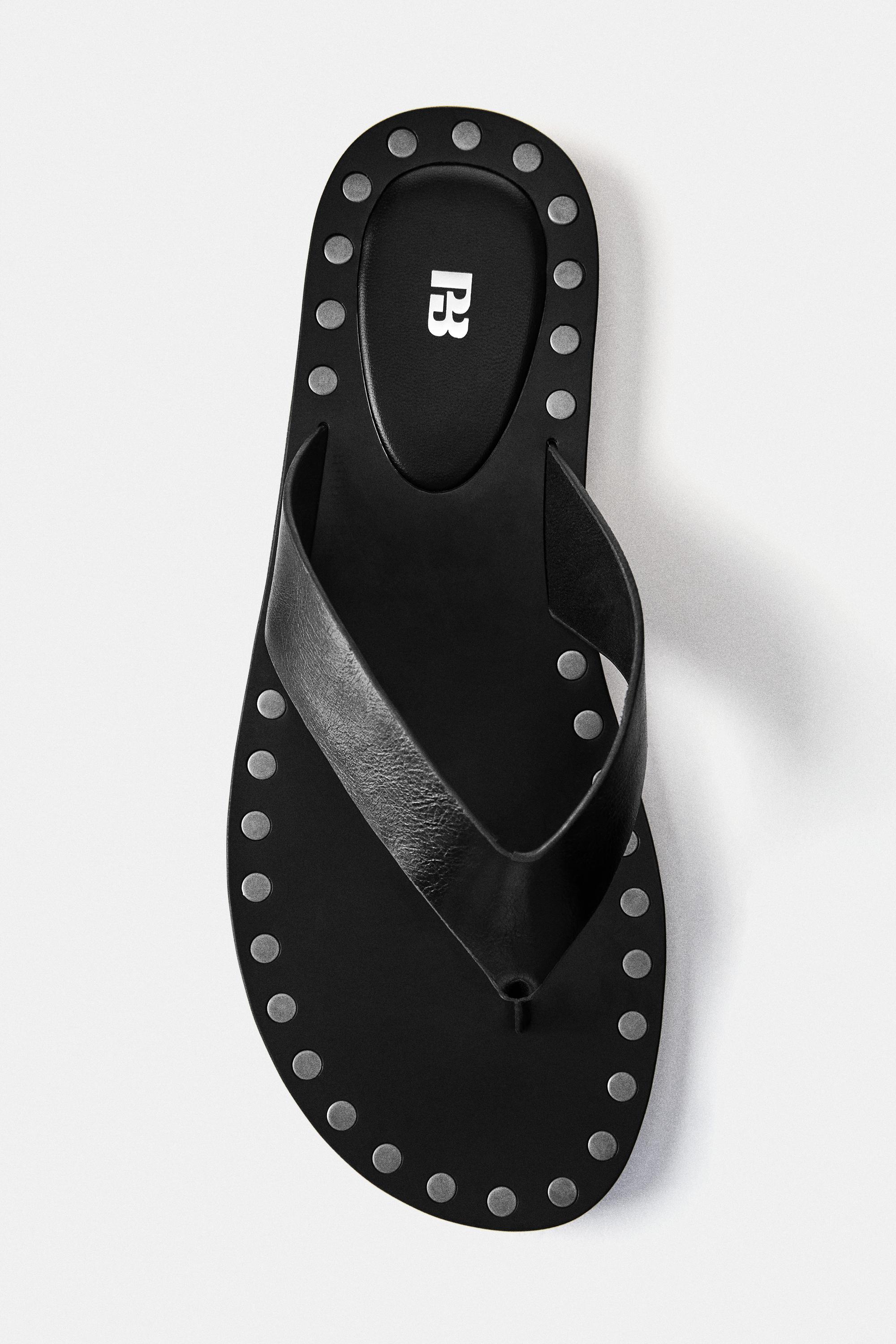 Flat studded sandals — Black