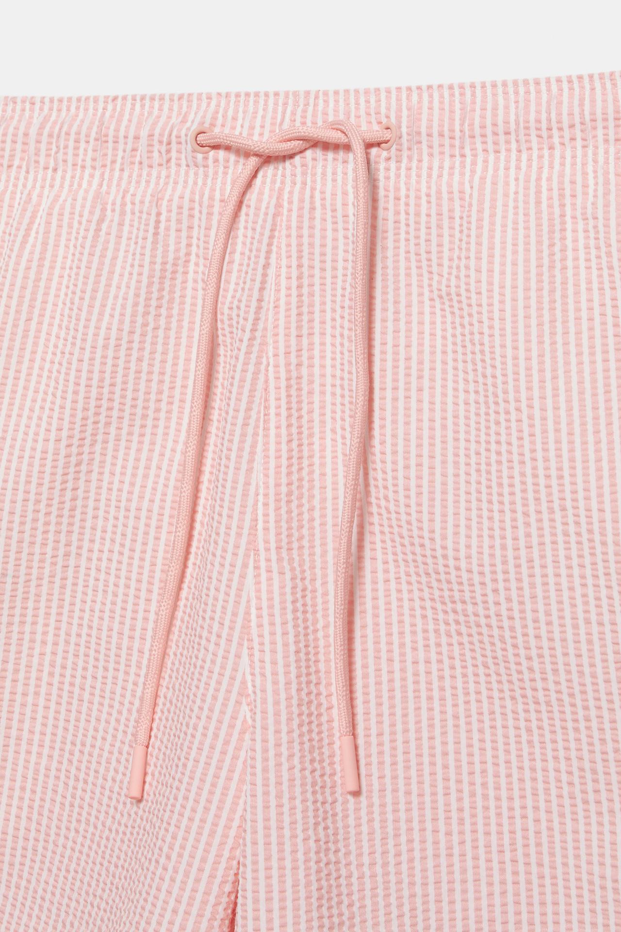Striped seersucker swimming trunks — Pink