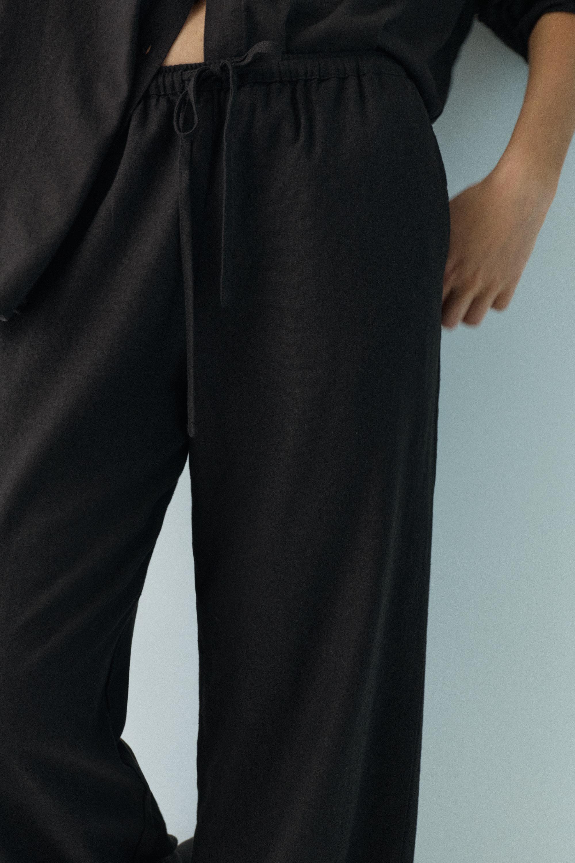 Flowy trousers with linen — Black