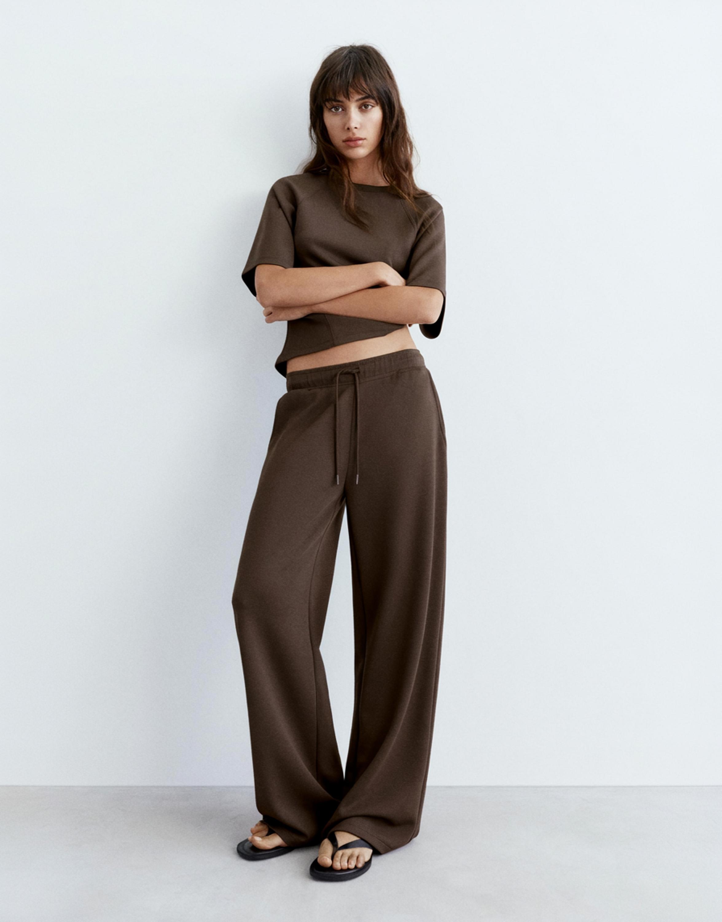Soft-touch wide-leg trousers — Brown