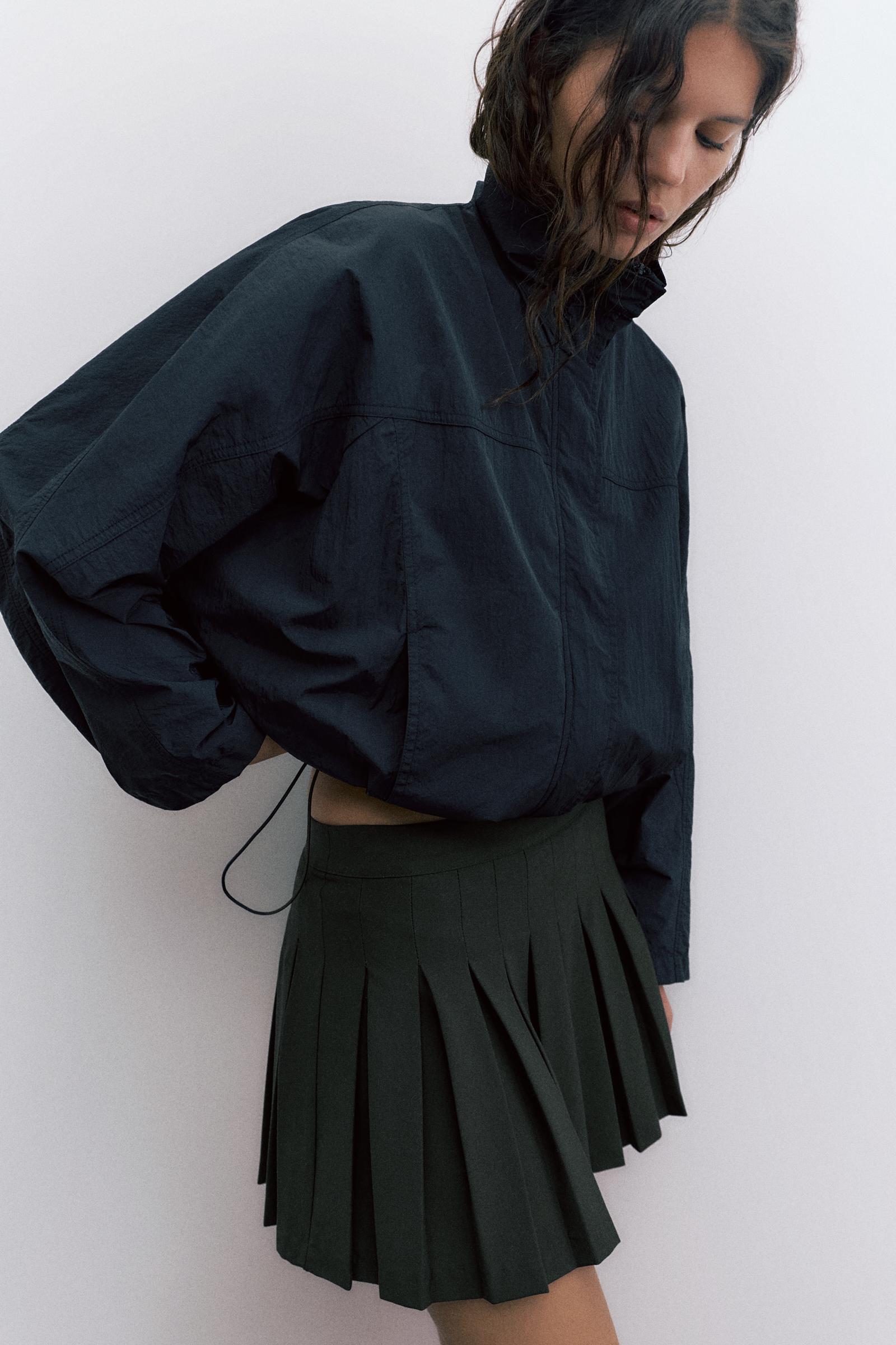Pleated mini skirt — Black