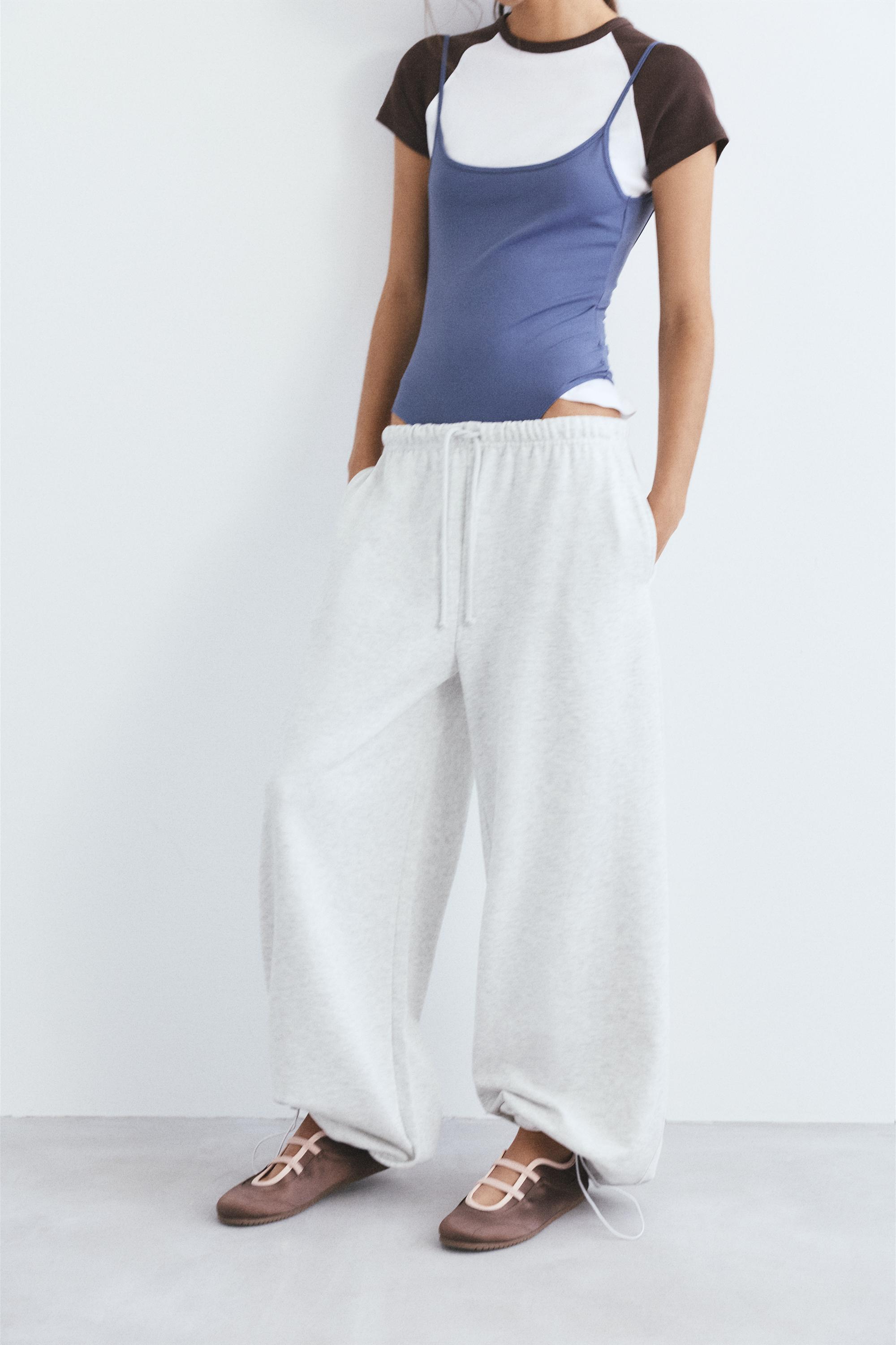 Wide-leg tracksuit bottoms with adjustable hem — Grey marl
