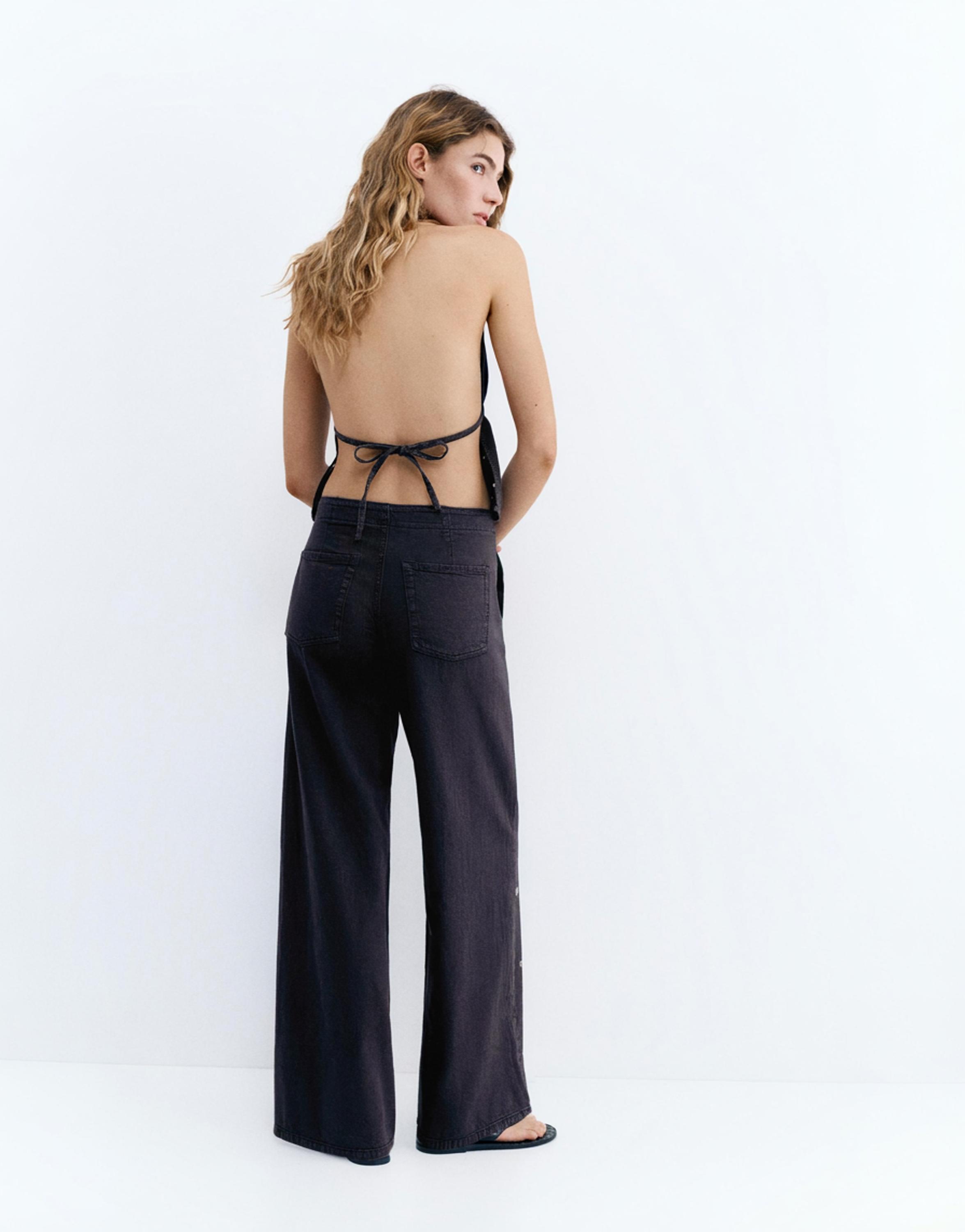 Straight-leg jeans with eyelets — Black