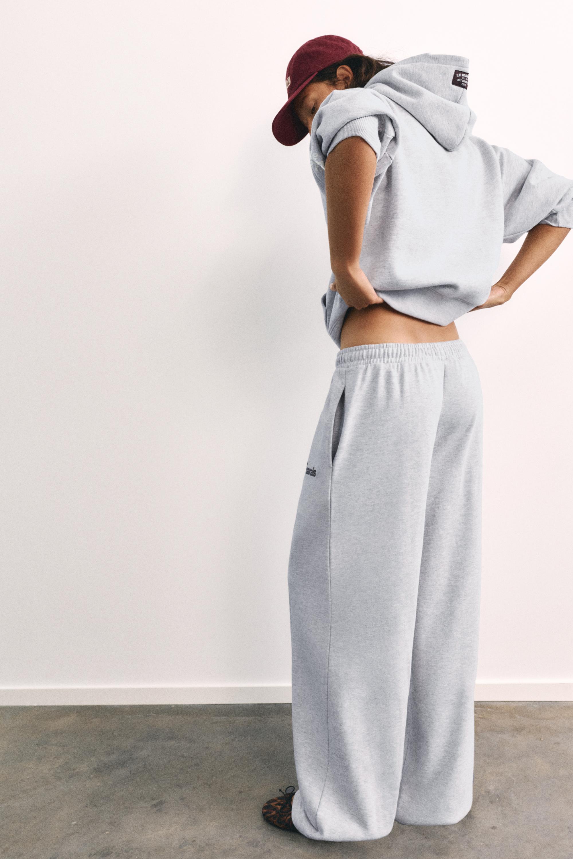 Graphic wide-leg trousers — Grey marl