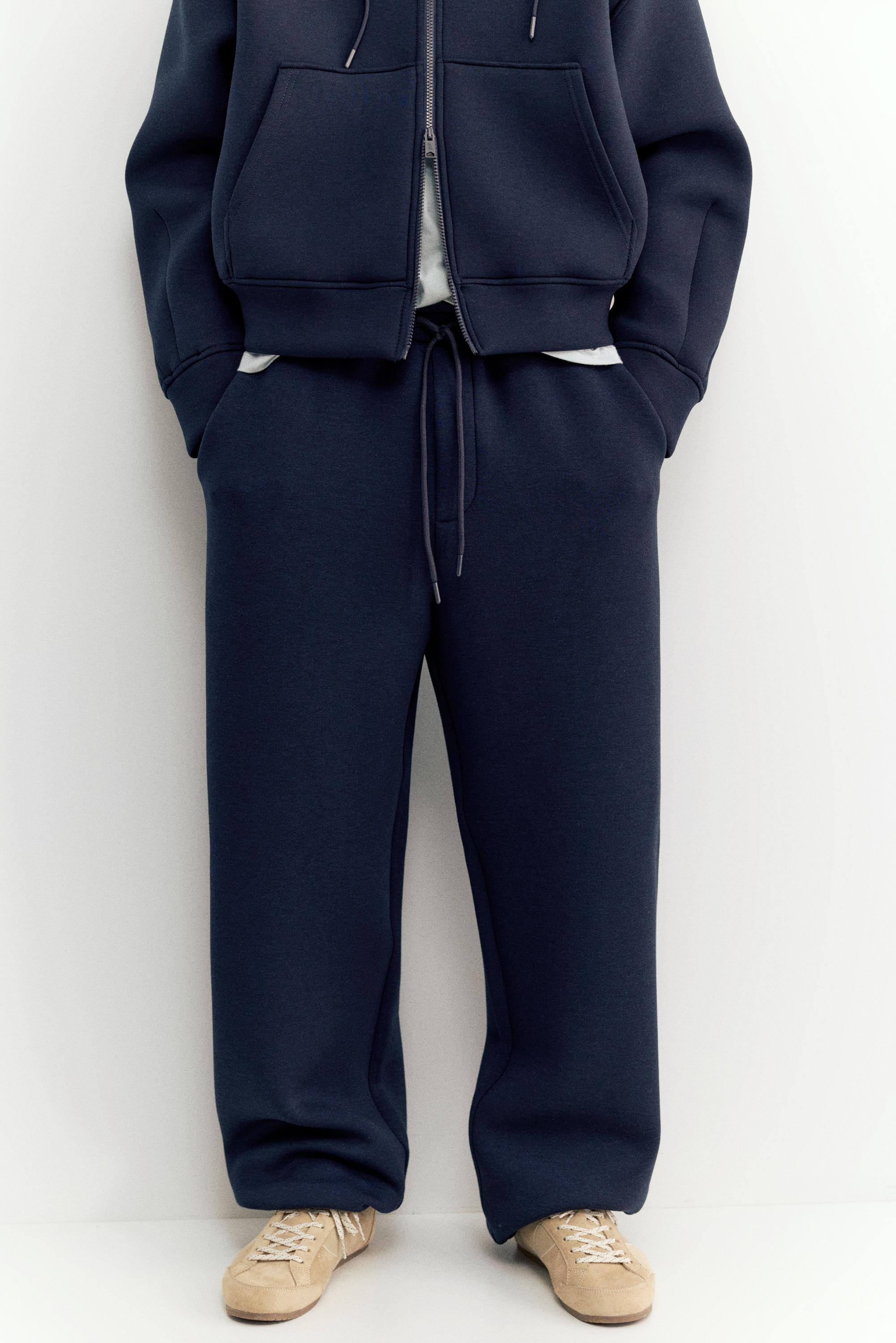 Neoprene-effect baggy trousers — Navy