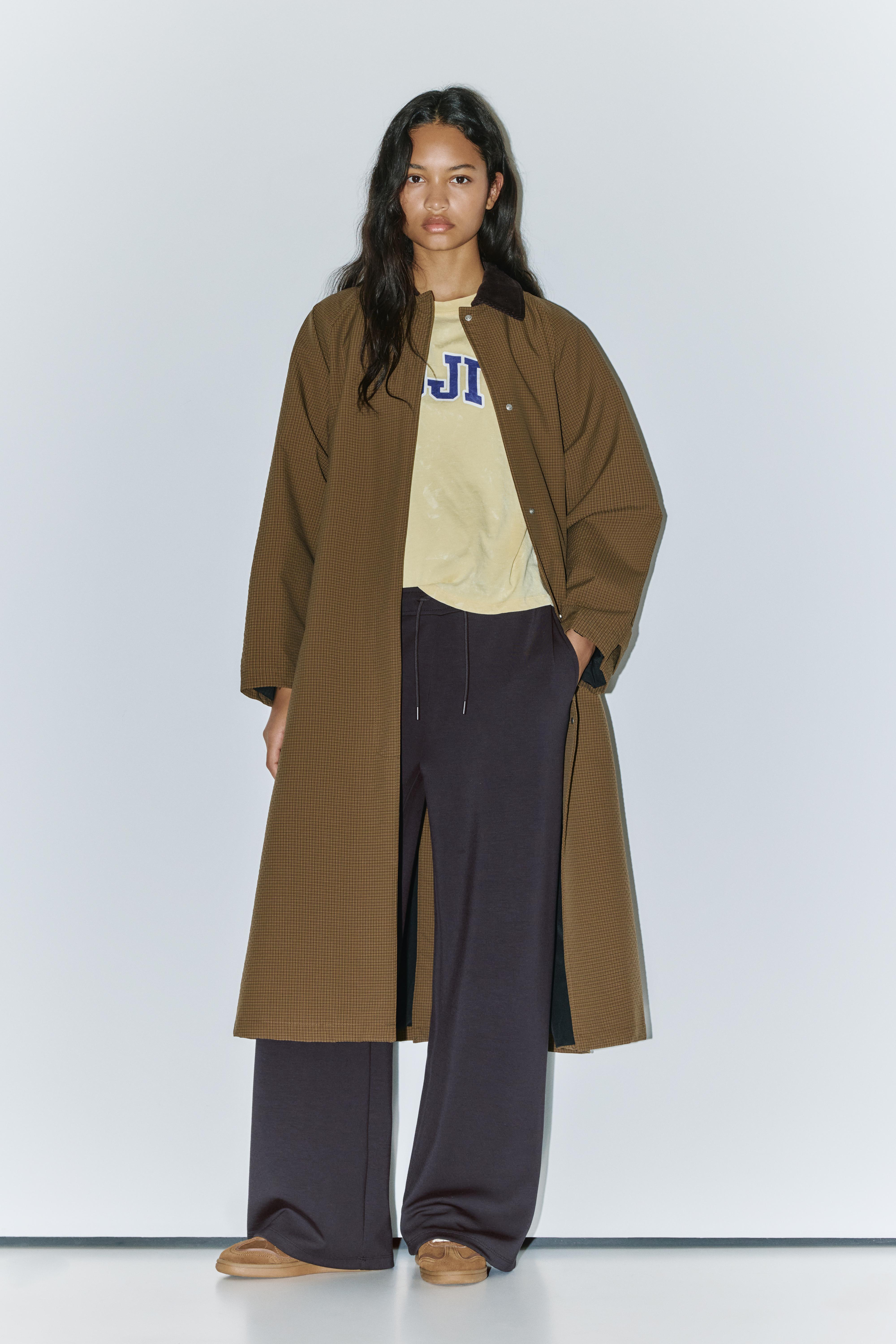 Soft-touch wide-leg trousers — Black