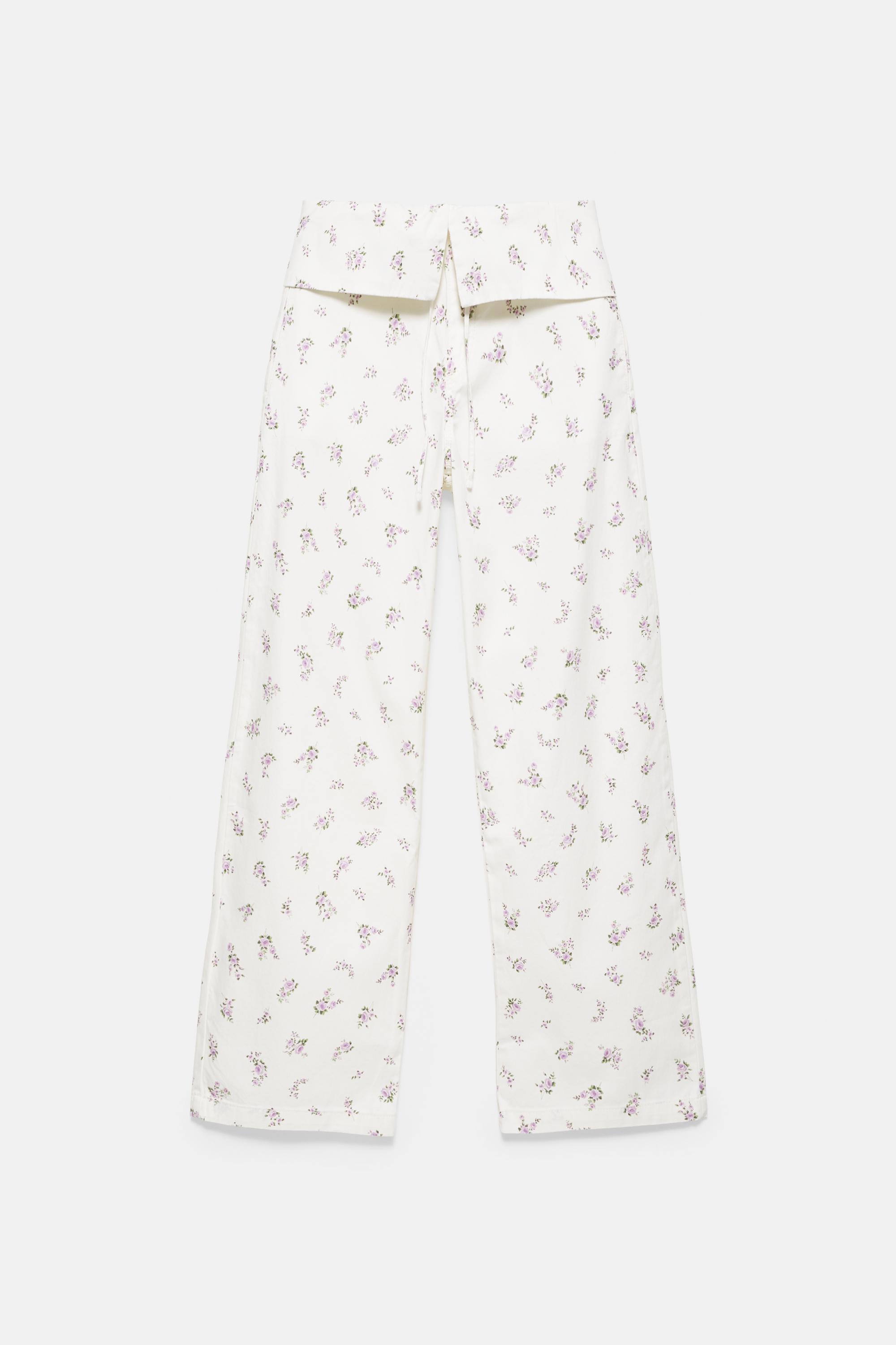 Floral trousers with turn-up waist — White