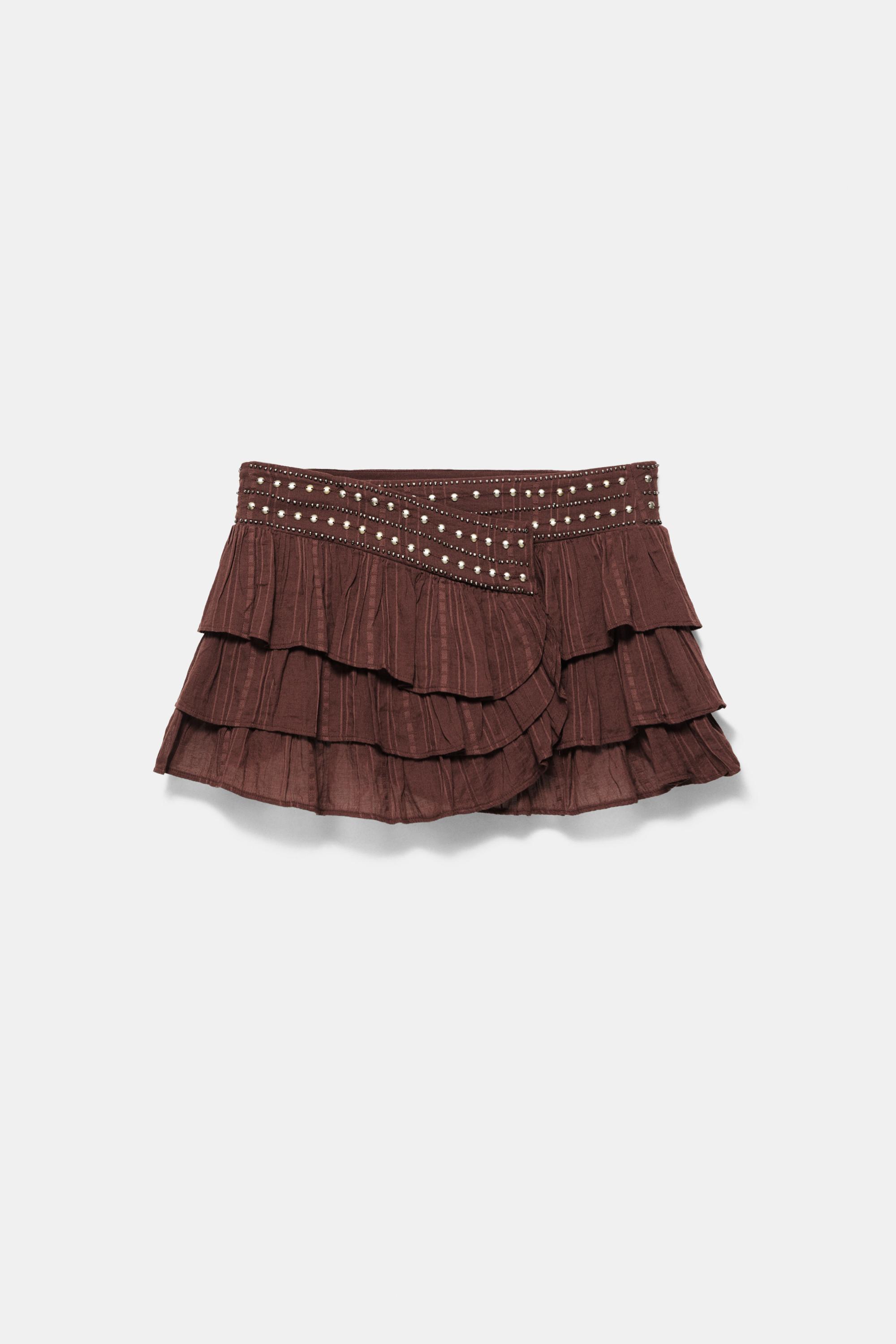 Ruffled mini skirt with studs — Brown