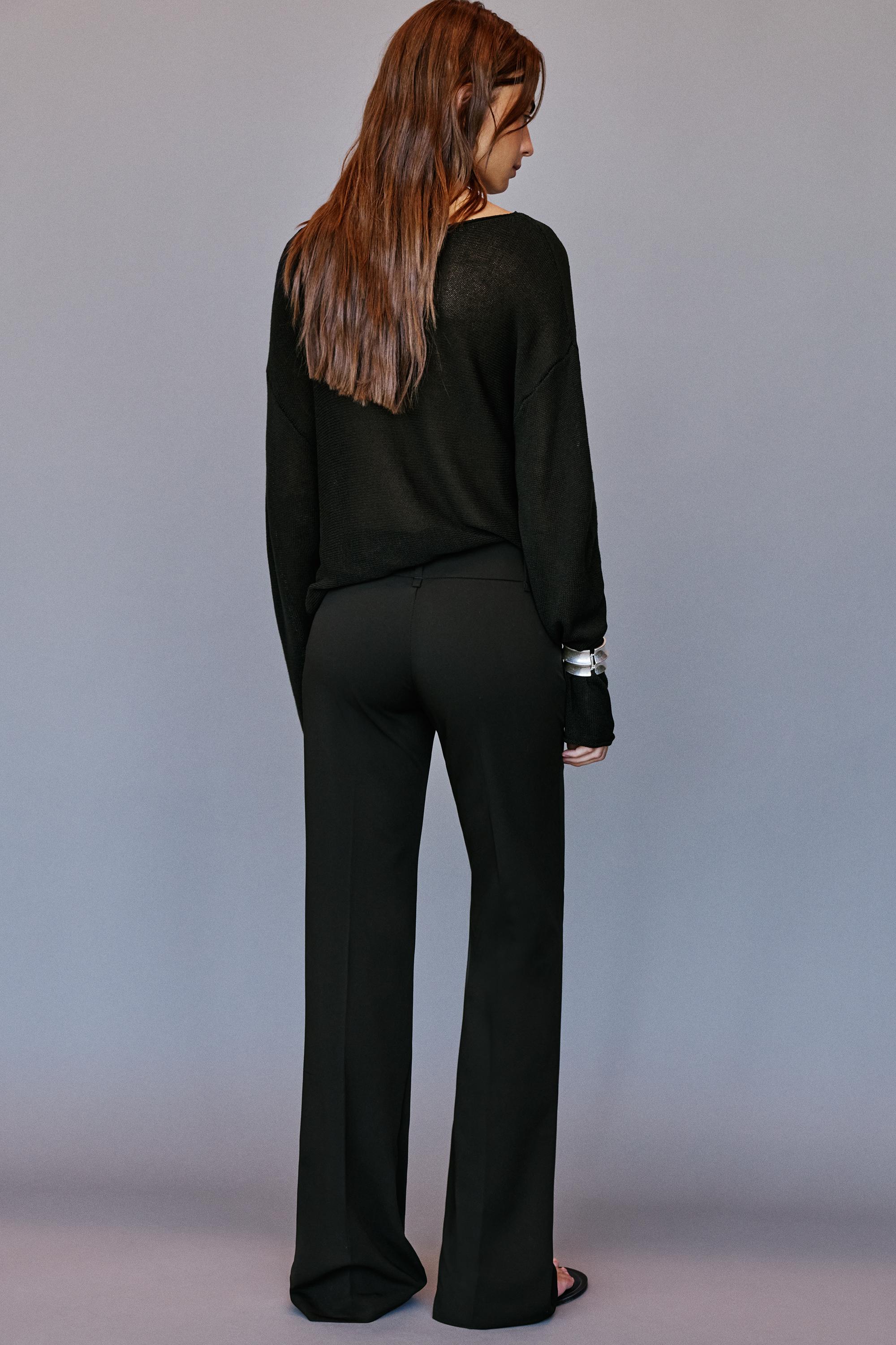Flared trousers with belt loops — Black