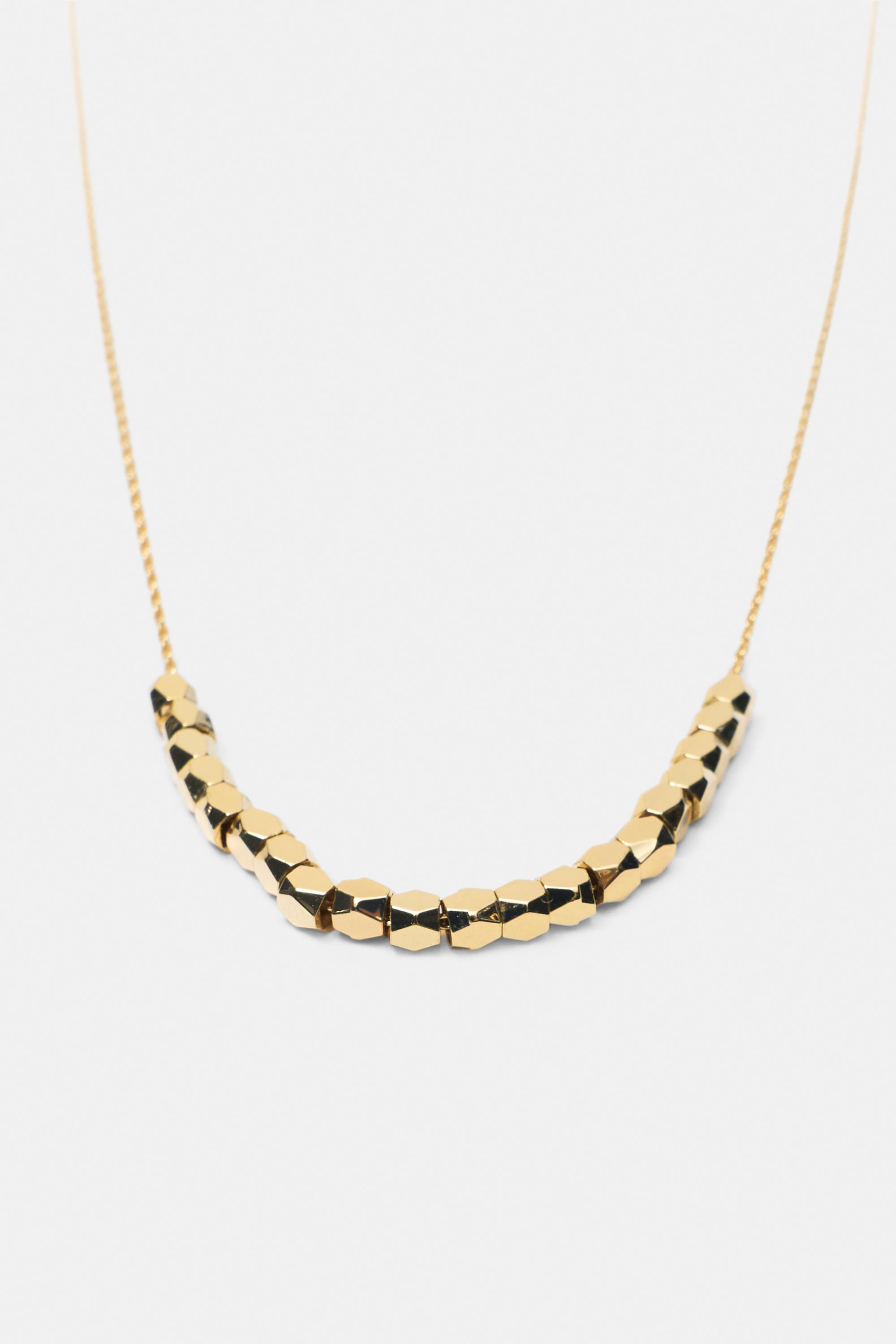 Beaded necklace — Gold