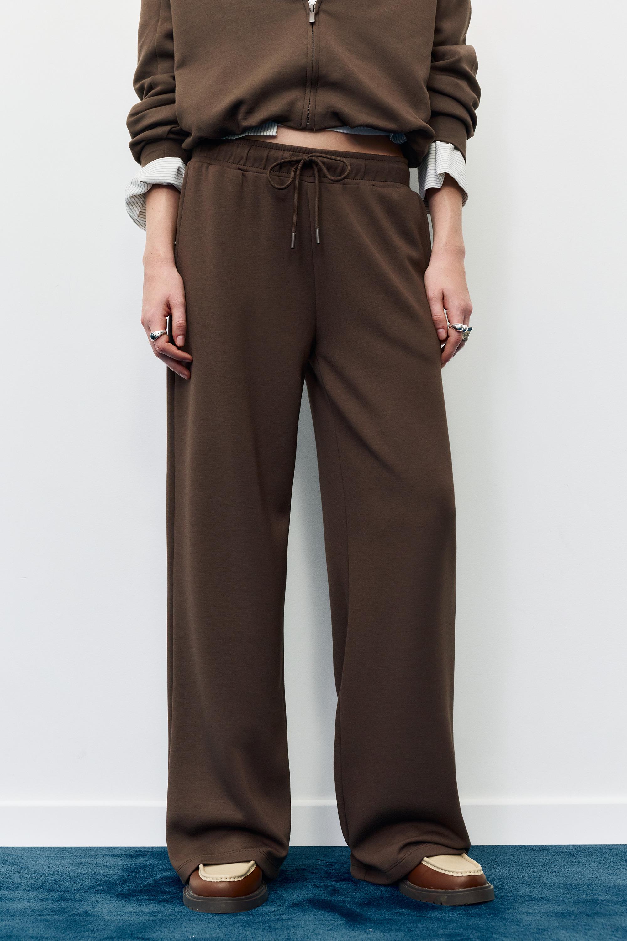 Soft-touch wide-leg trousers — Brown