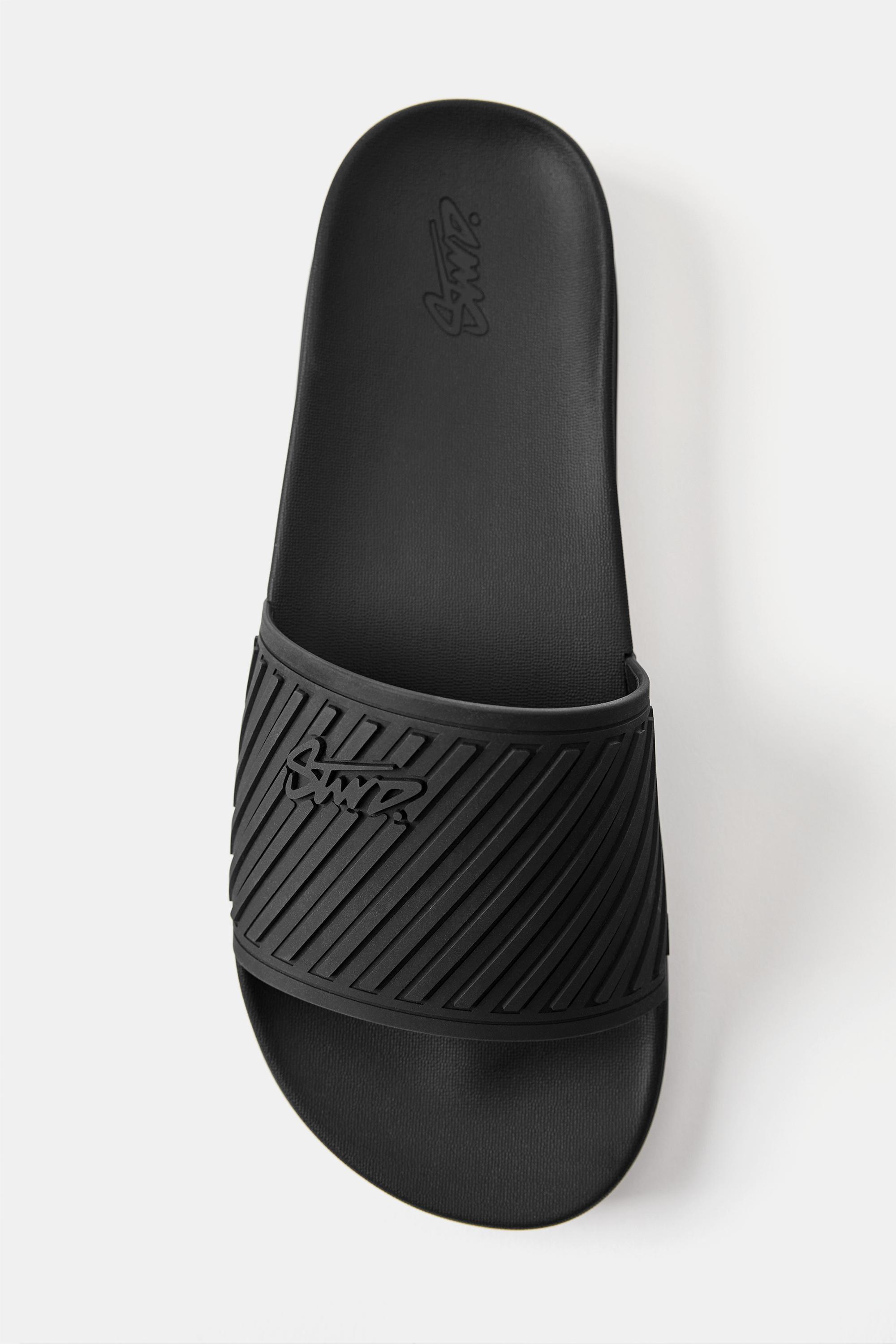 STWD rubberised sandals — Black