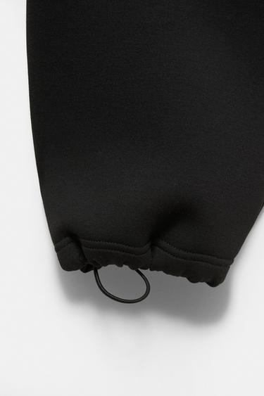 Neoprene-effect baggy trousers — Black 8