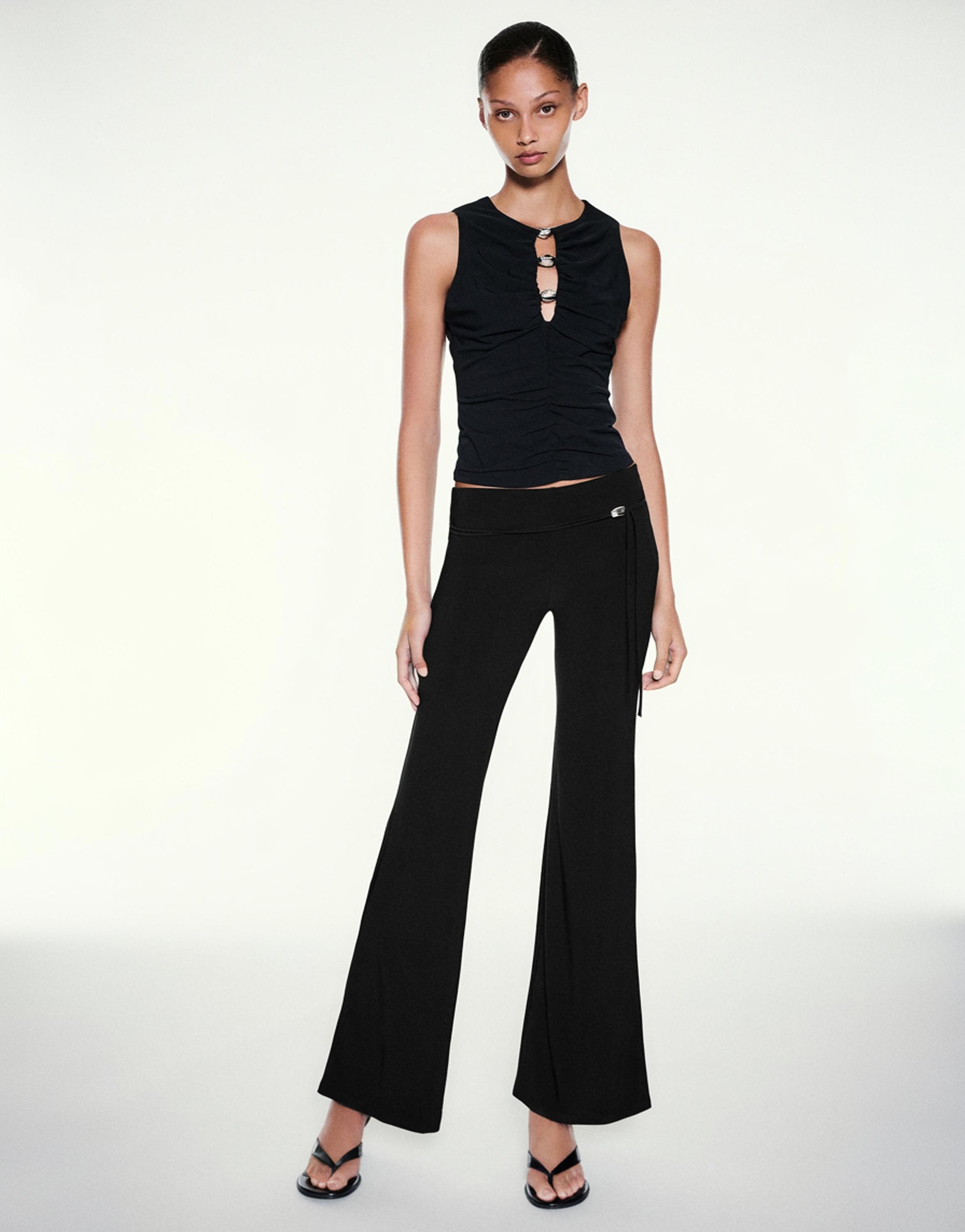 Black flared trousers — Black