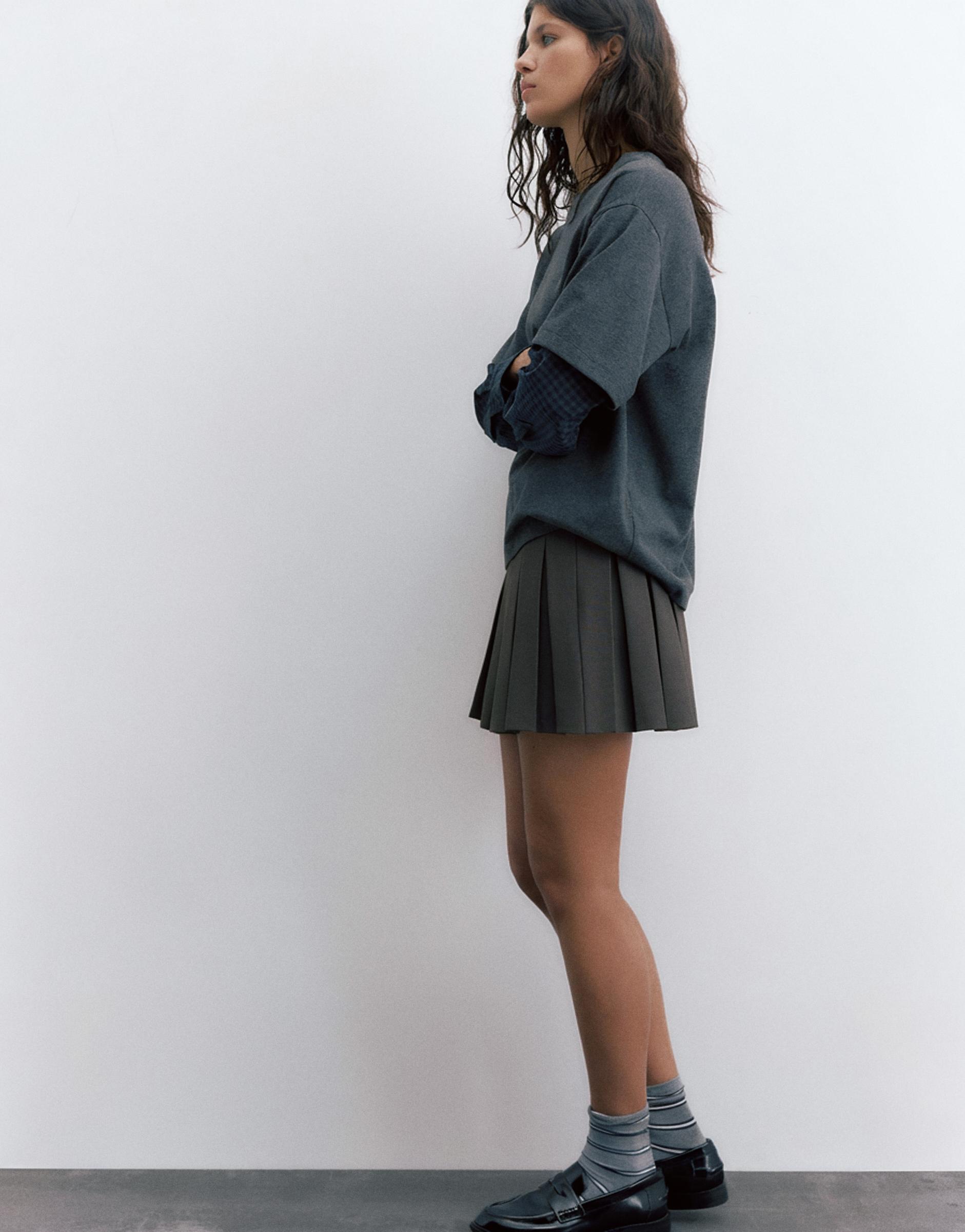 Pleated mini skirt — Grey marl