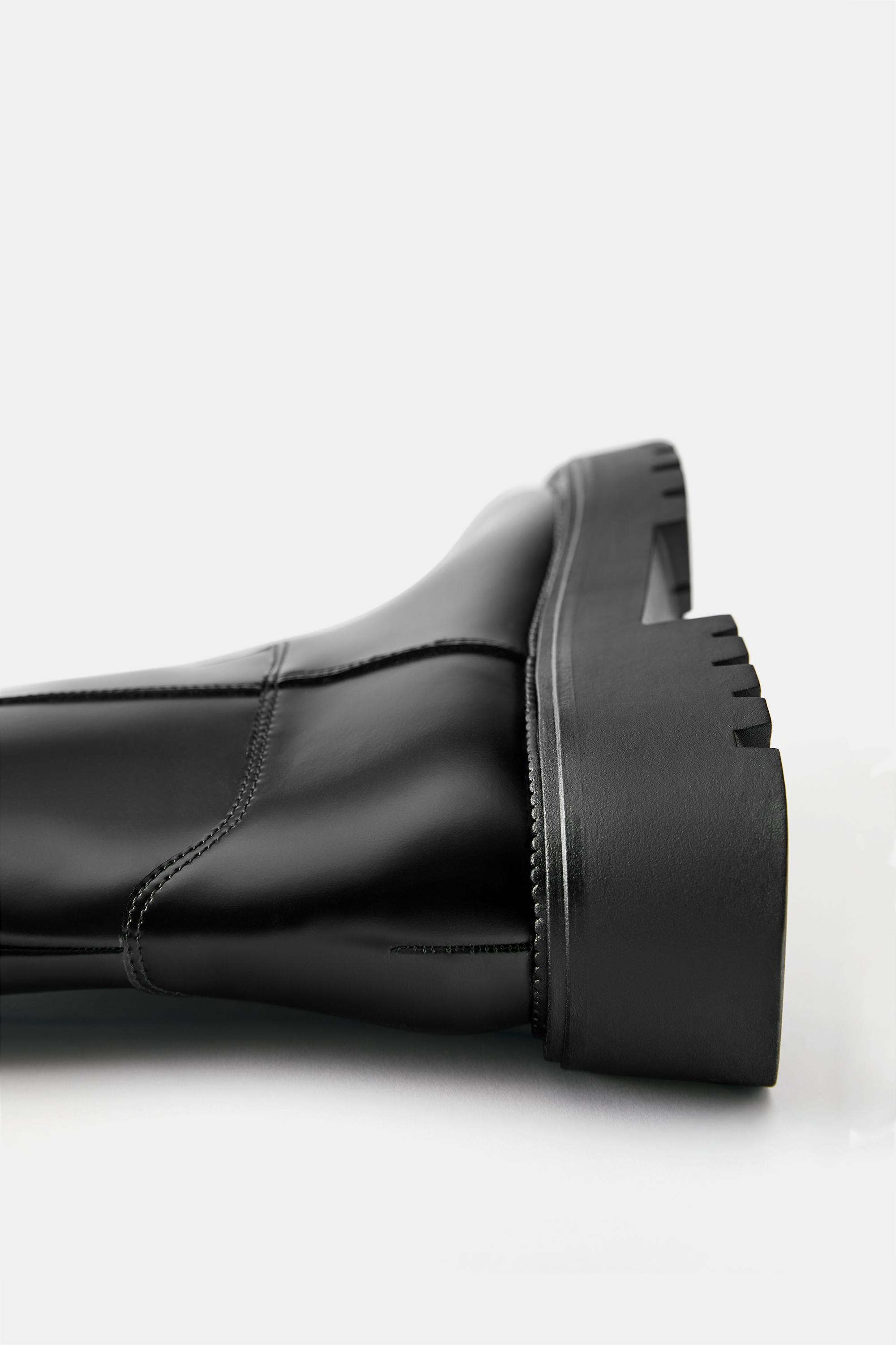 Flat high boots — Black