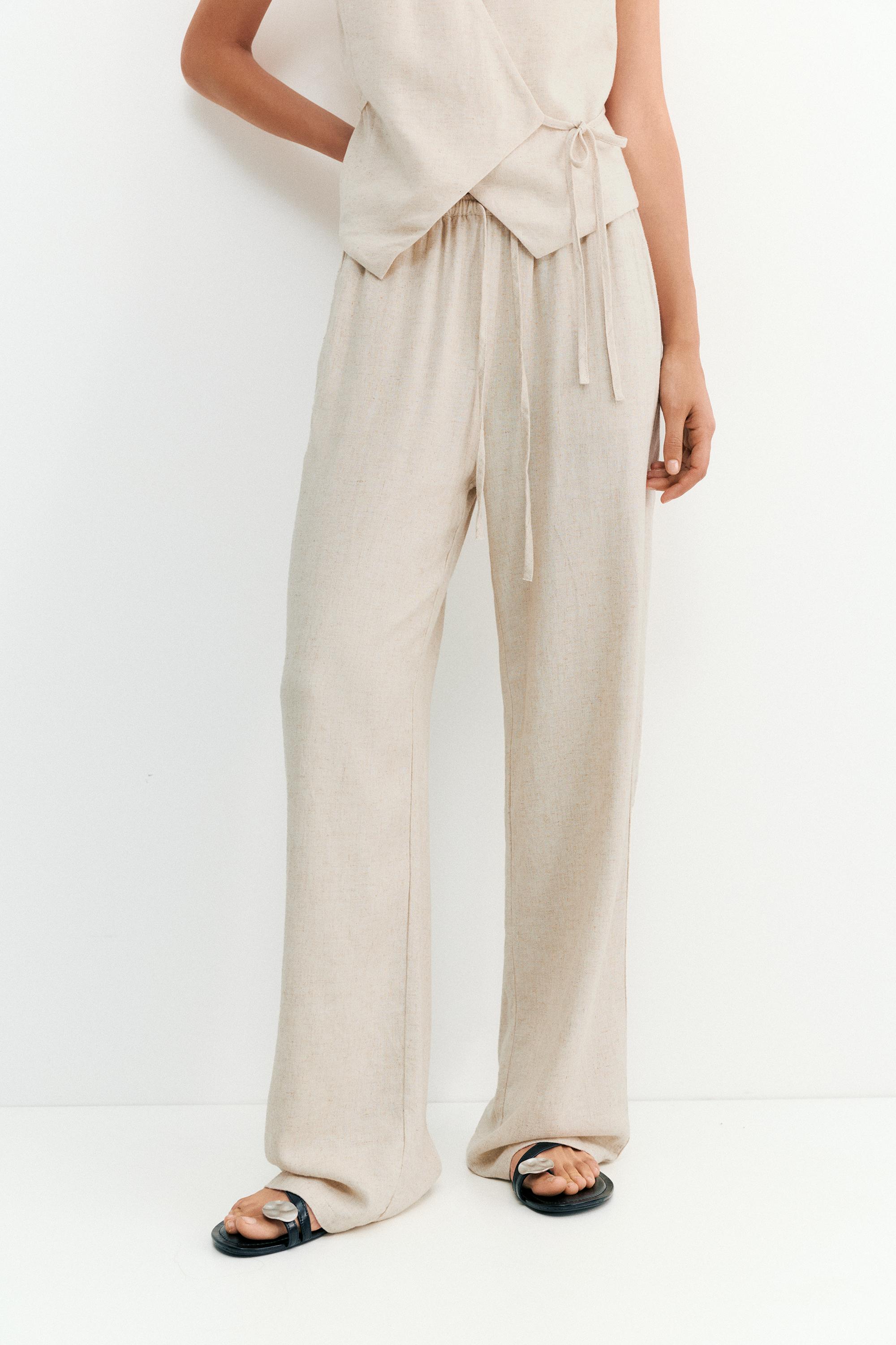 Flowy trousers with linen — Beige