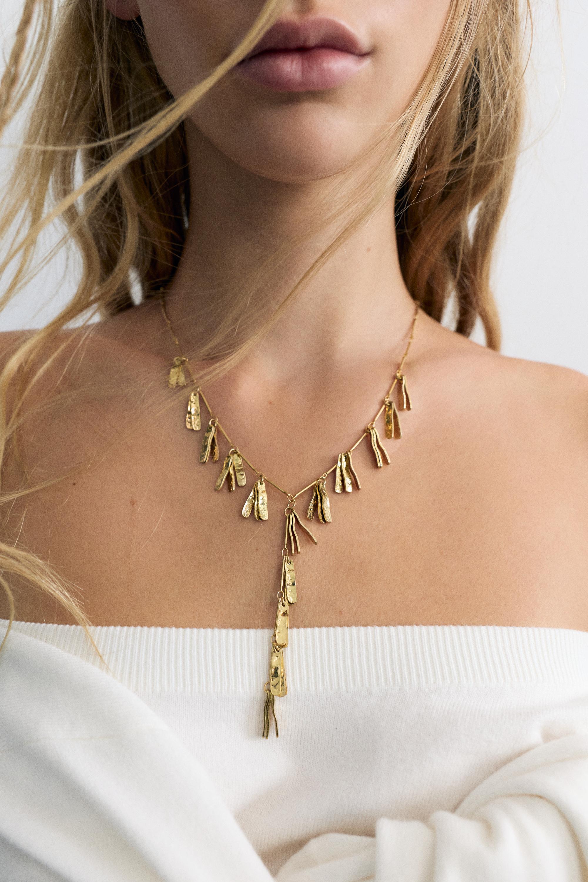 Long cascading necklace — Gold