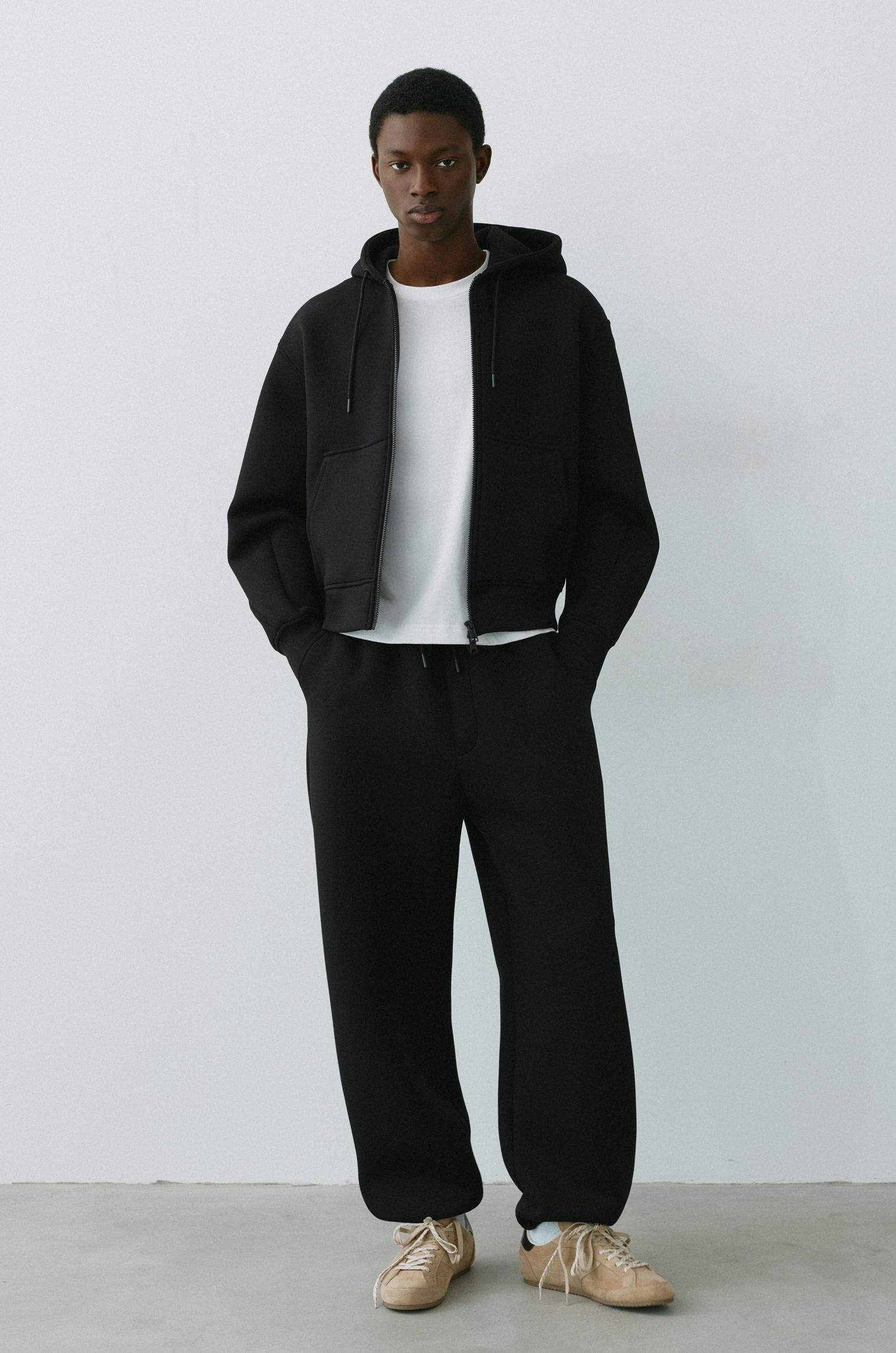 Neoprene-effect baggy trousers — Black