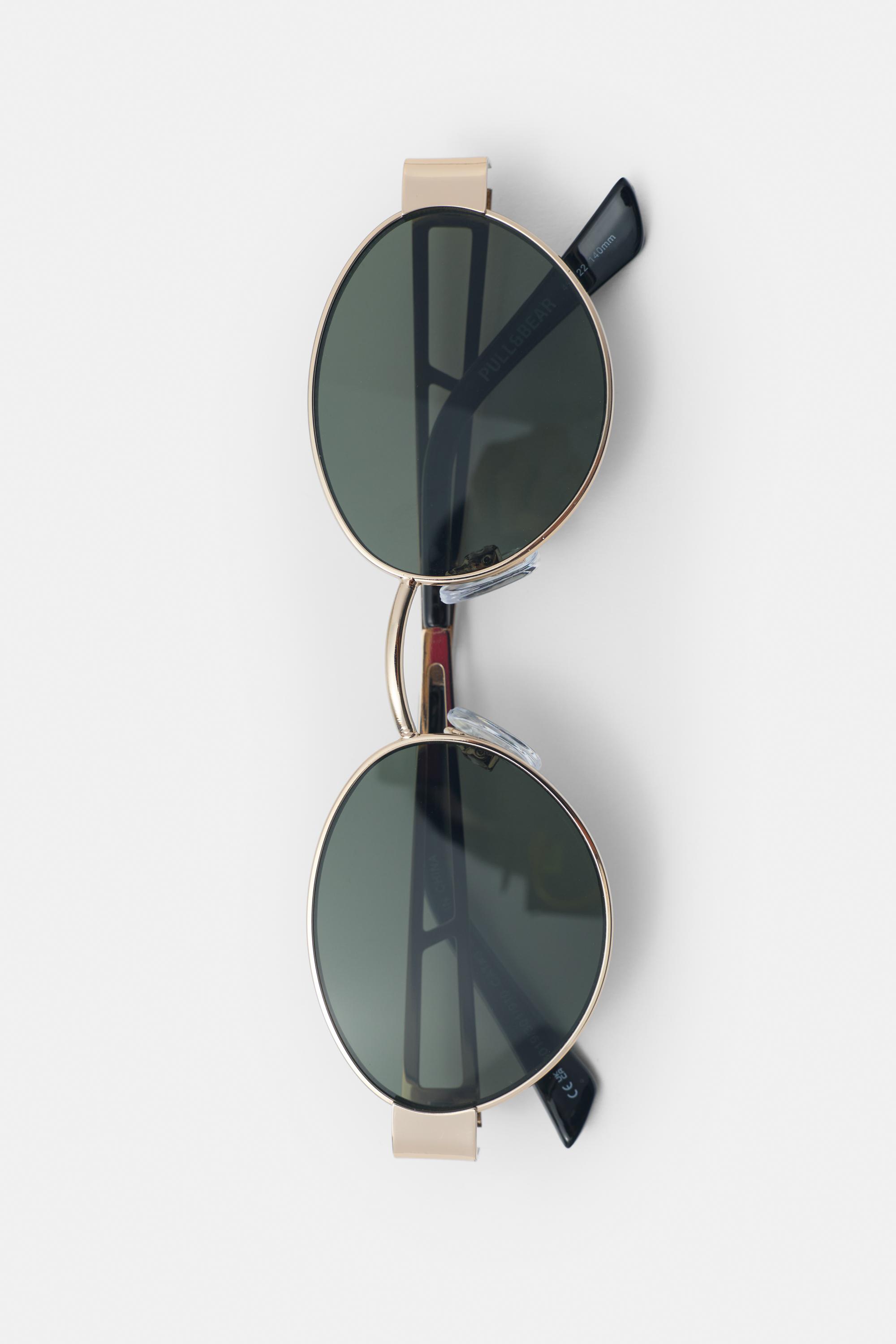 Metallic oval sunglasses — Gold