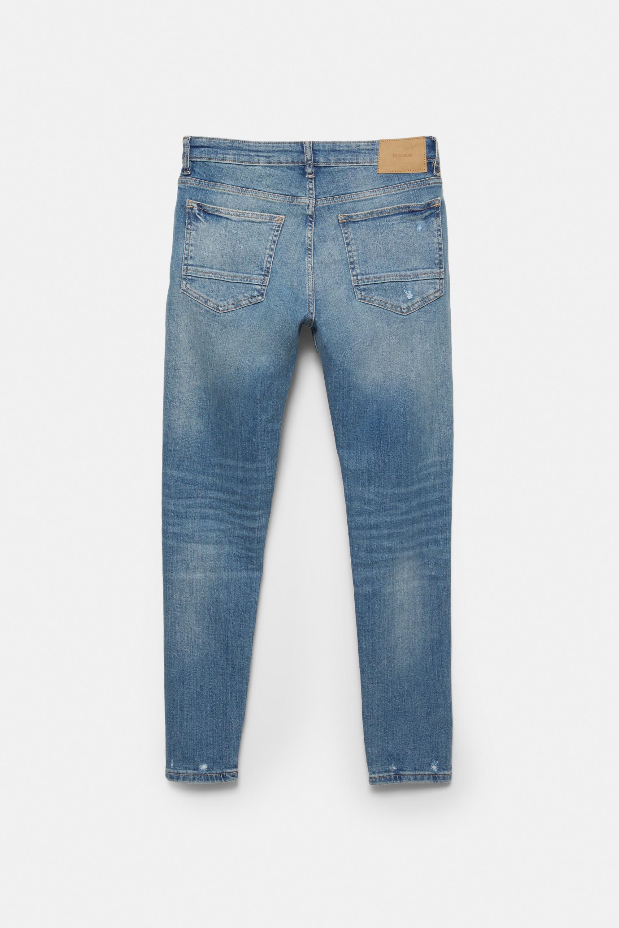 Ripped skinny jeans — Medium blue