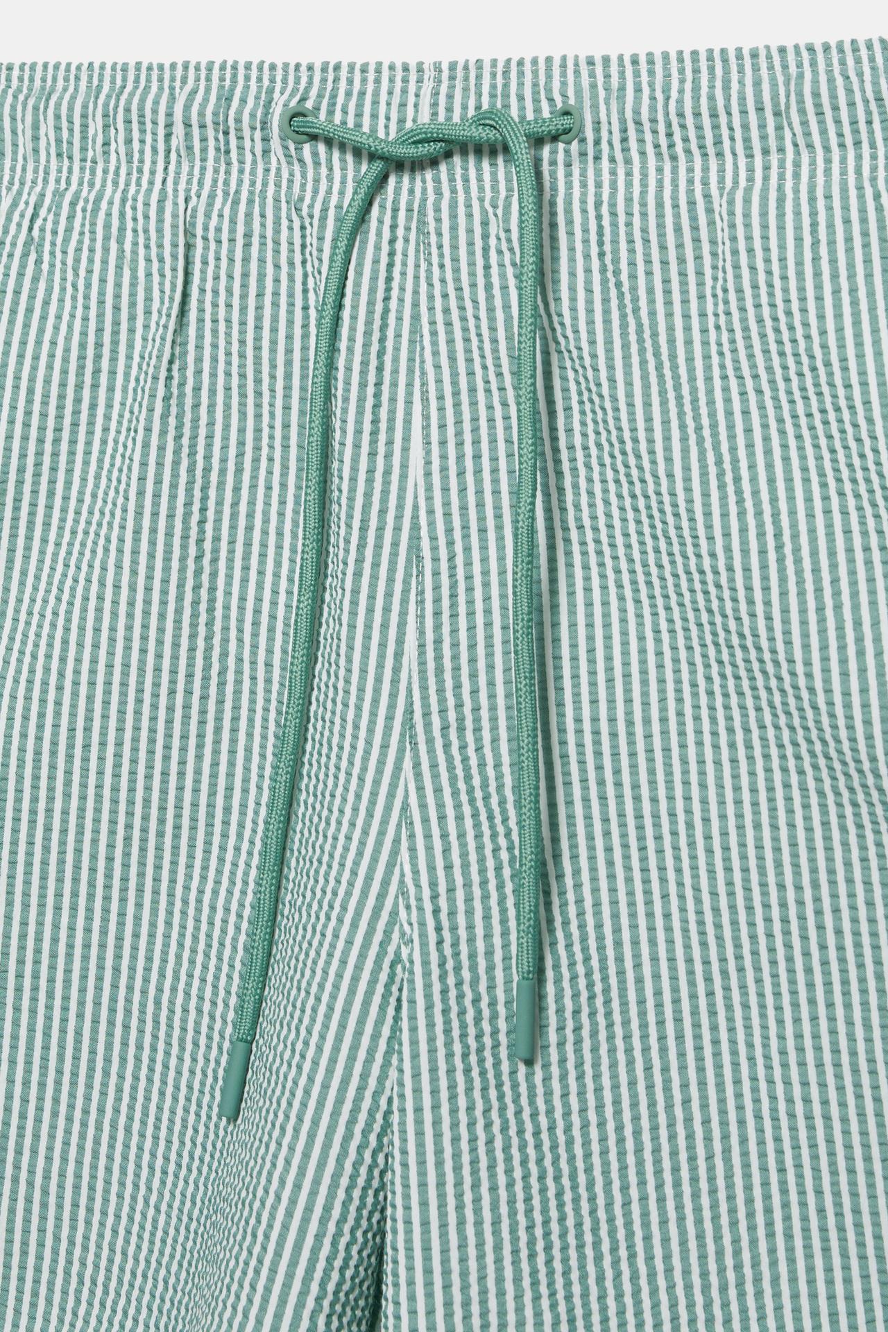 Striped seersucker swimming trunks — Green