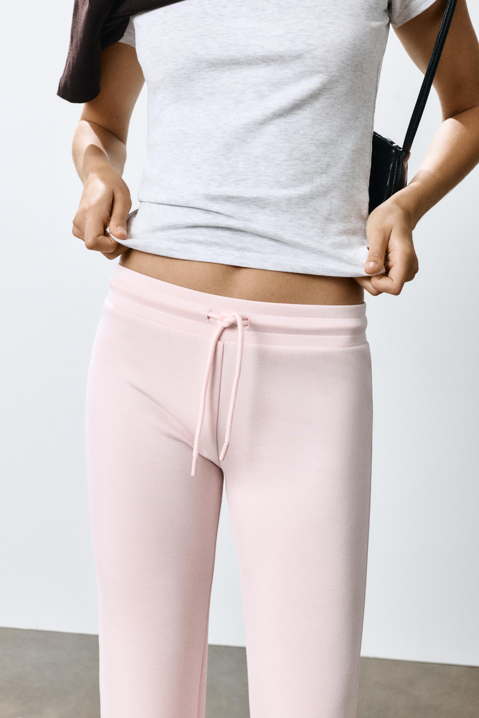 Modal flared trousers — Pastel pink