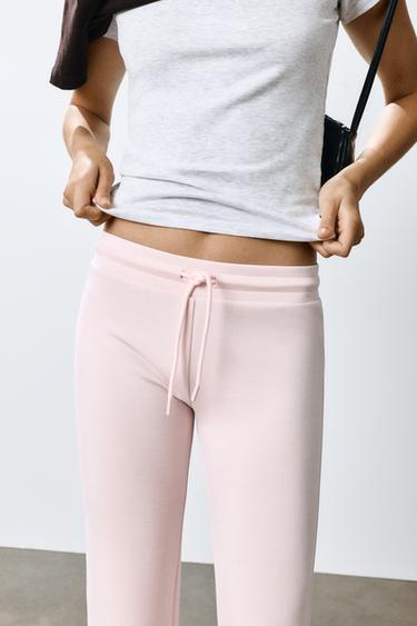 Soft-touch flared trousers — Pastel pink 4