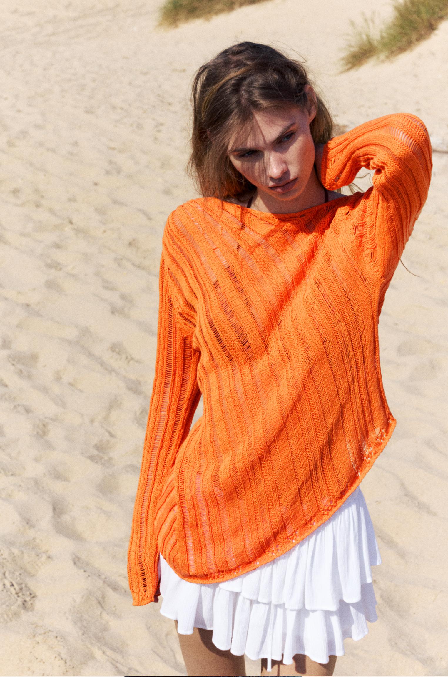 Maglia Arancione In Tessuto Smagliato