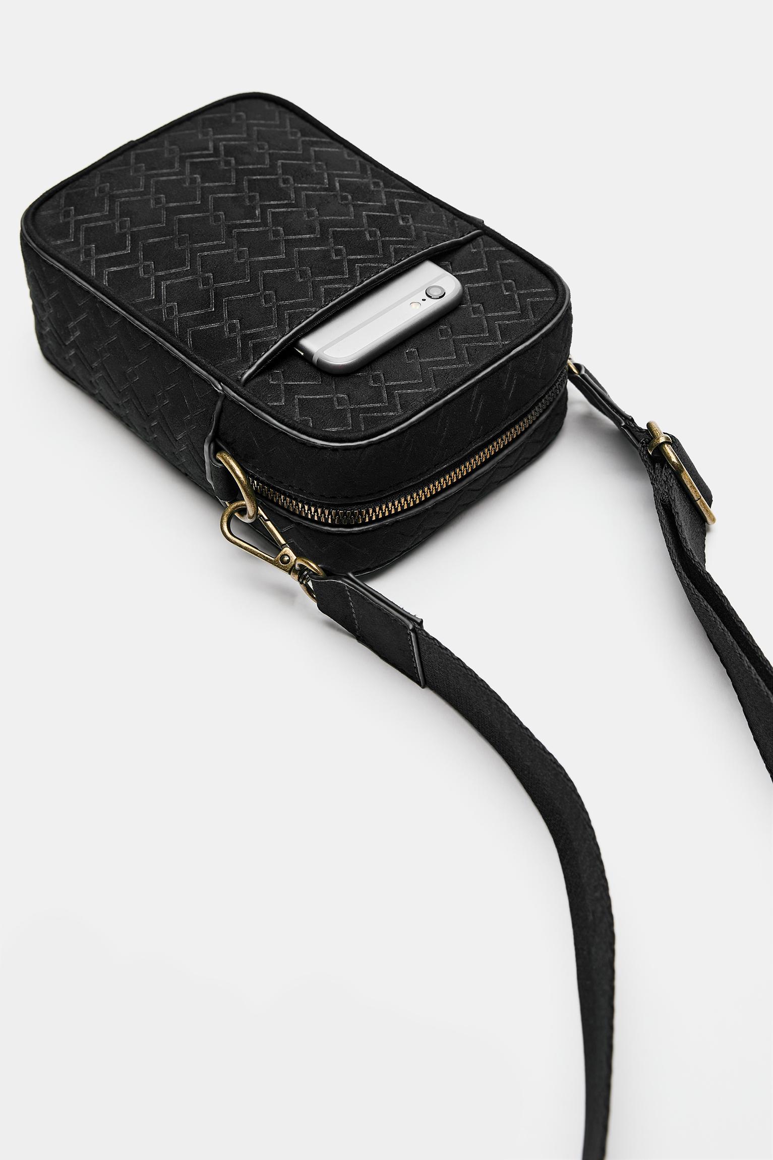 STWD kabartmalı çapraz askılı çanta