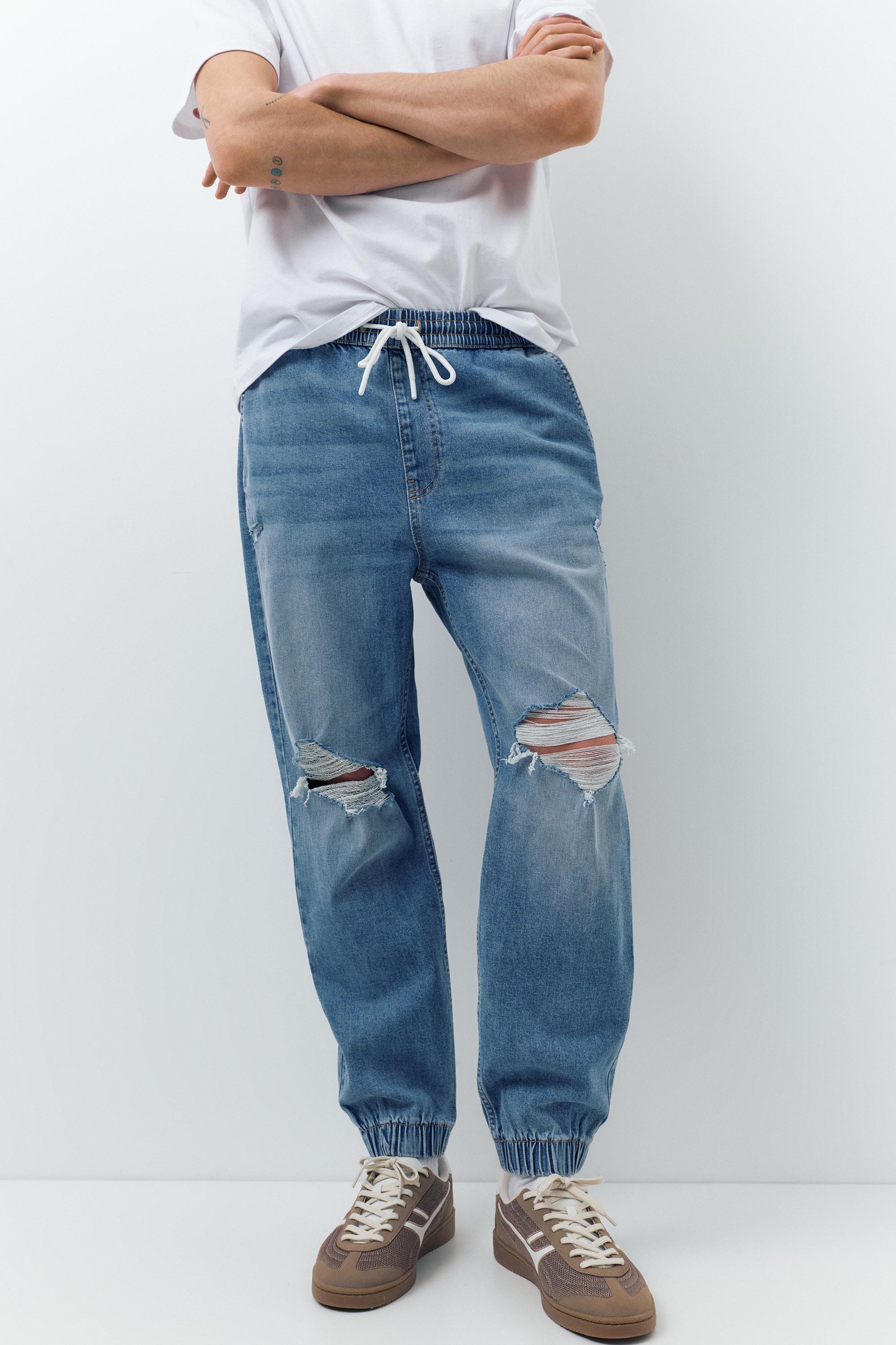 Ripped denim jogger trousers — Pale indigo